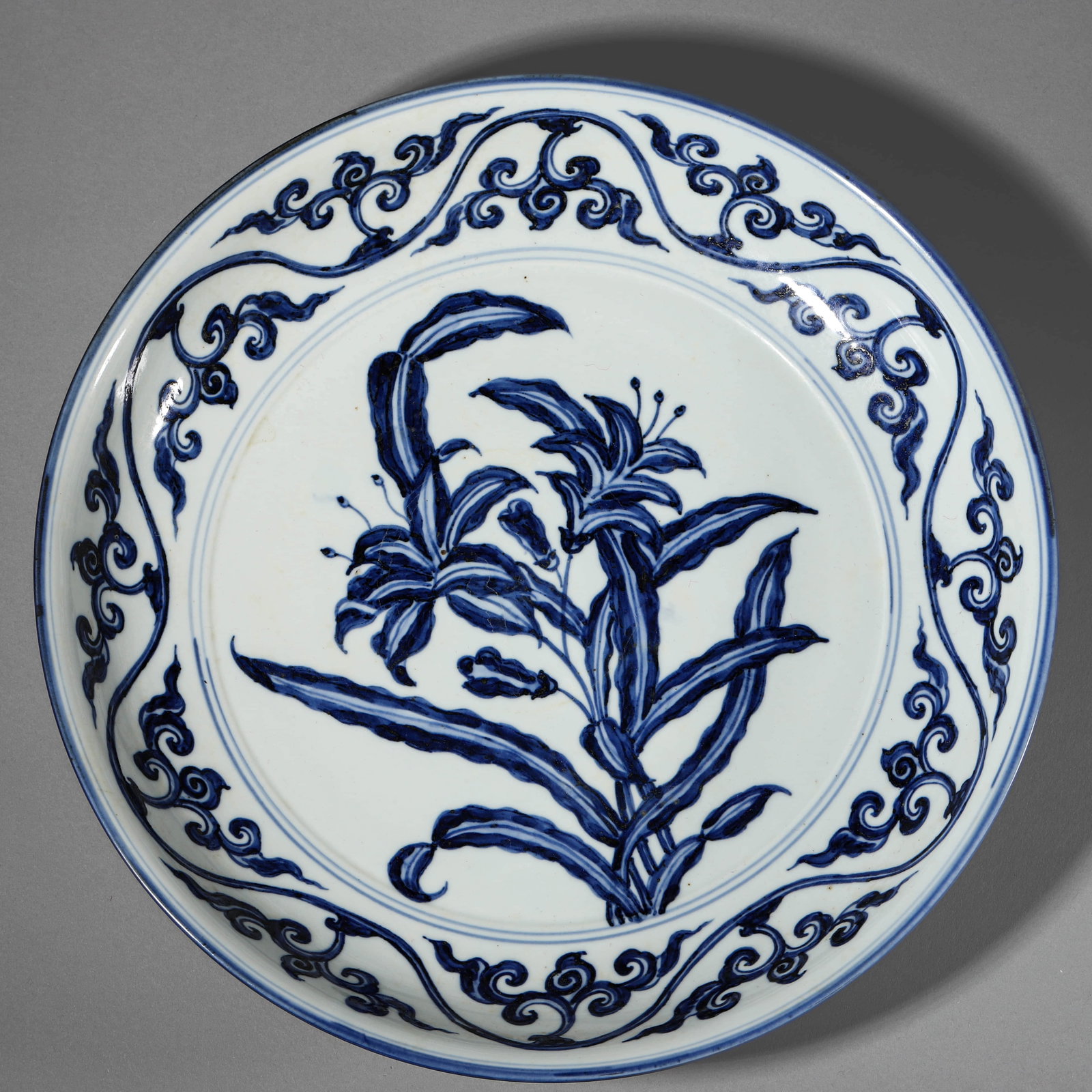 A BLUE AND WHITE 'LOTUS' DISH: A BLUE AND WHITE 'LOTUS' DISH Height: 2 5/16 in. (5.9 cm), Diameter: 14 3/8 in. (36.5 cm)