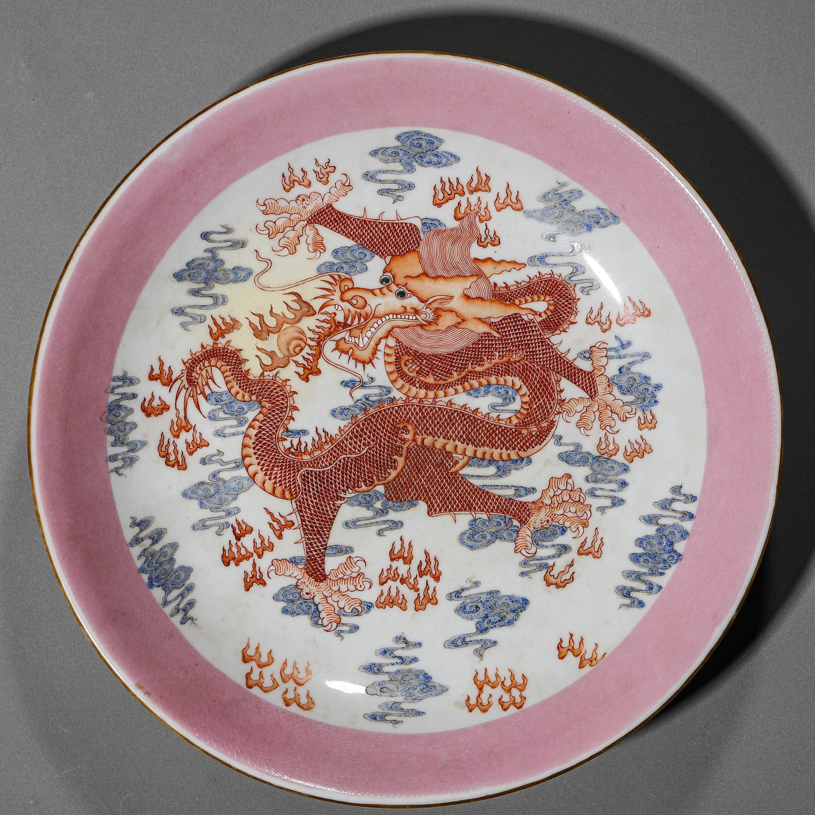AN IRON-RED 'SEA AND DRAGON' DISH: AN IRON-RED 'SEA AND DRAGON' DISH Diameter: 12 in. (30.5 cm)