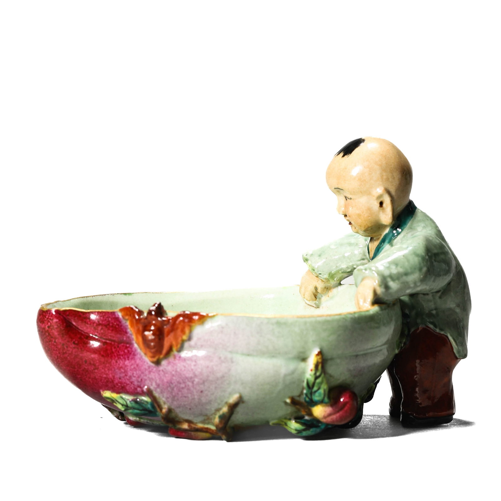 A PORCELAIN WATER POT: A PORCELAIN WATER POT Height: 3 3/8 in. (8.5 cm), Length: 4 7/8 in. (12.5 cm), Width: 3 15/16 in. (10 cm)