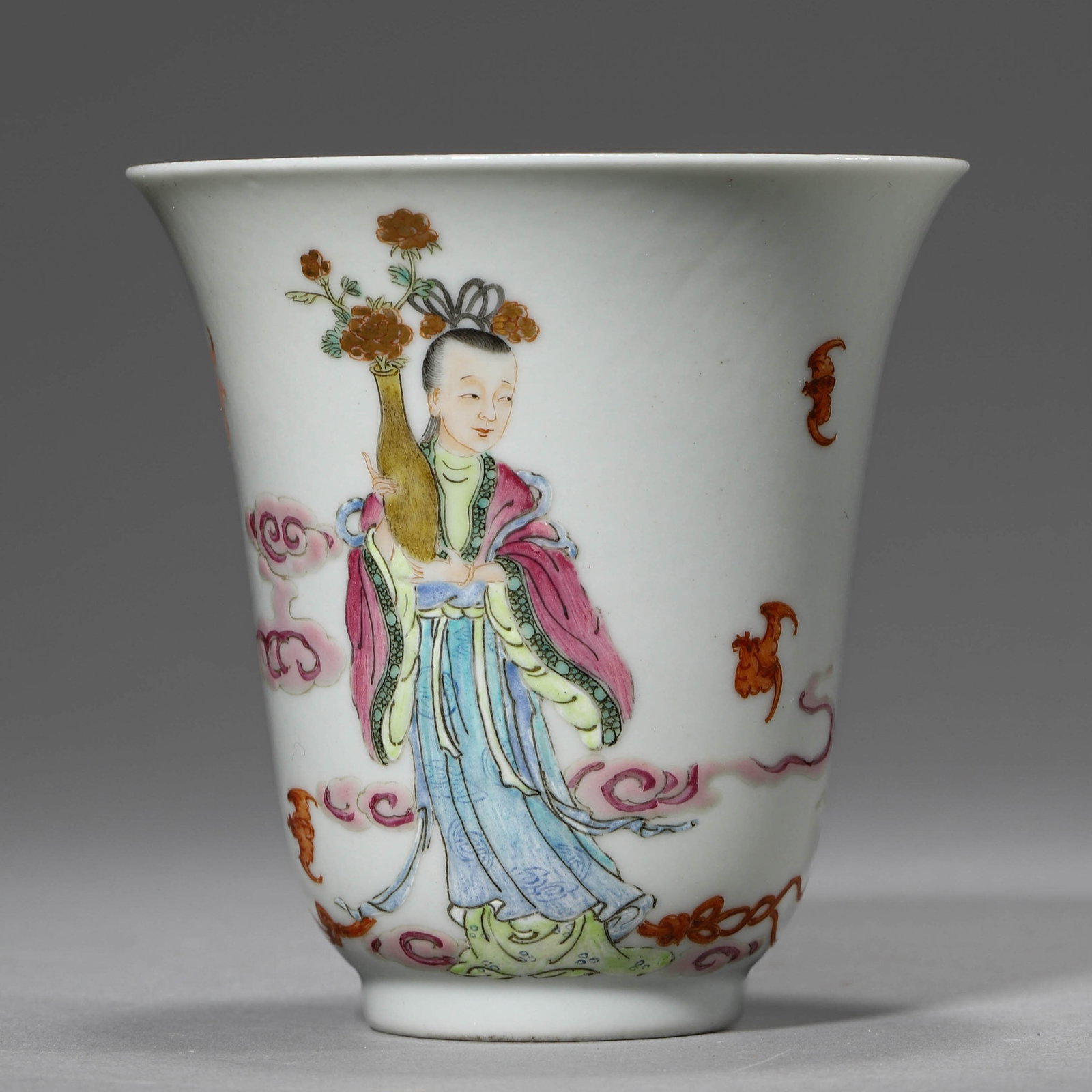 A FAMILLE ROSE 'FIGURES' BELL SHAPED CUP: A FAMILLE ROSE 'FIGURES' BELL SHAPED CUP Diameter: 3 1/8 in. (8 cm), Height: 3 1/4 in. (8.3 cm)