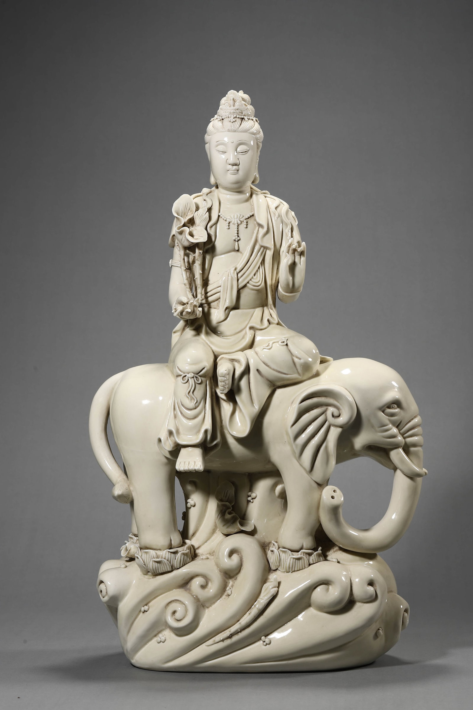 A DEHUA TYPE PUXIAN BODHISATTVA FIGURE: A DEHUA TYPE PUXIAN BODHISATTVA FIGURE Height: 22 1/16 in. (56 cm)