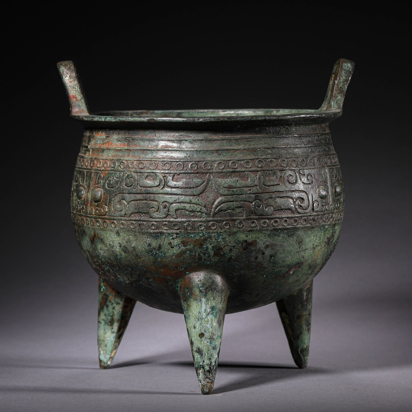 A BRONZE 'BEAST' TRIPOD CENSER: A BRONZE 'BEAST' TRIPOD CENSER Width: 6 7/8 in. (17.5 cm), Height: 7 5/16 in. (18.5 cm)