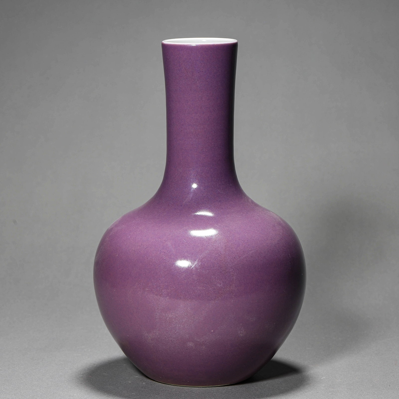 AN AUBERGINE-GLAZED VASE: AN AUBERGINE-GLAZED VASE Height: 9 1/16 in. (23 cm)