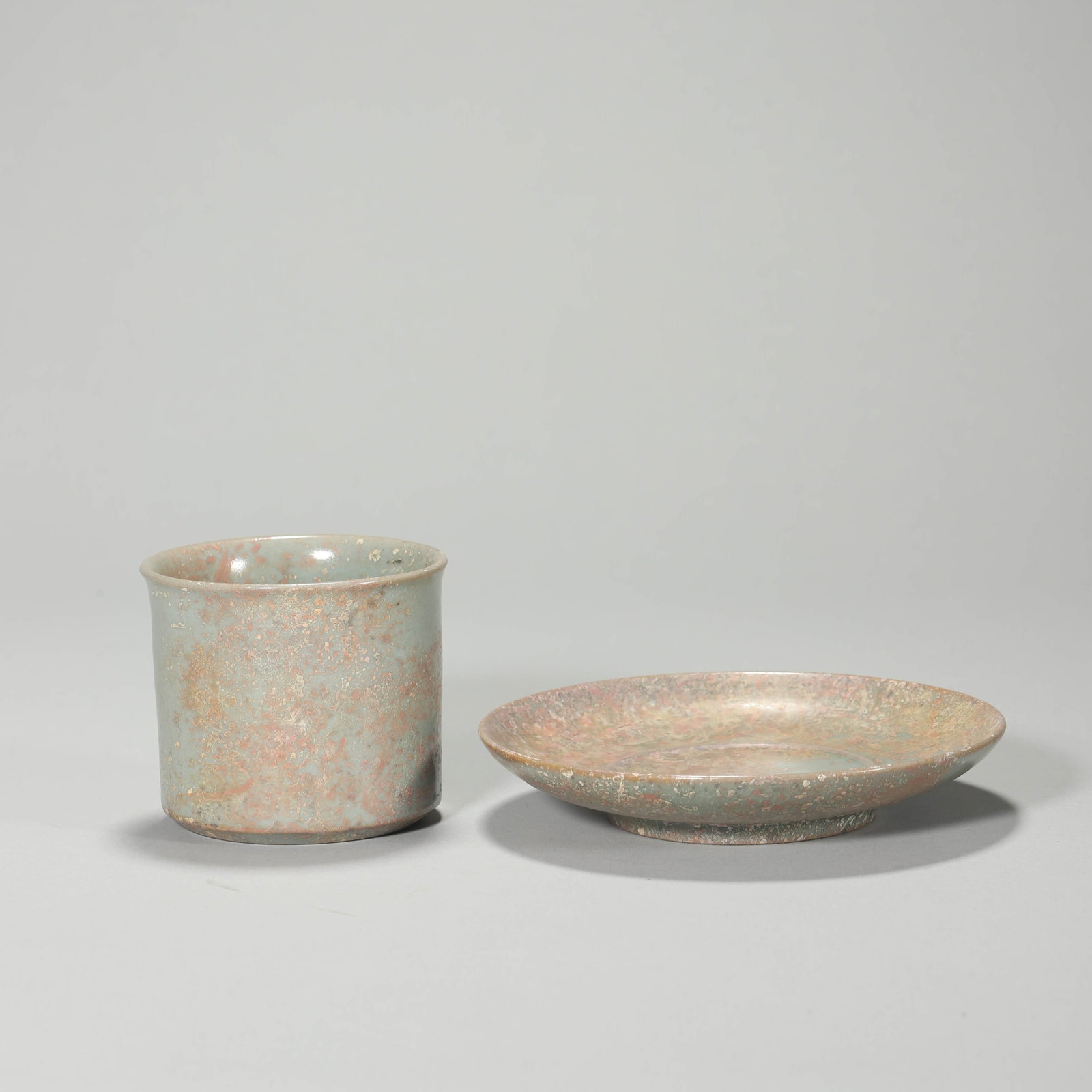 A TEACUP AND SAUCER SET - 2