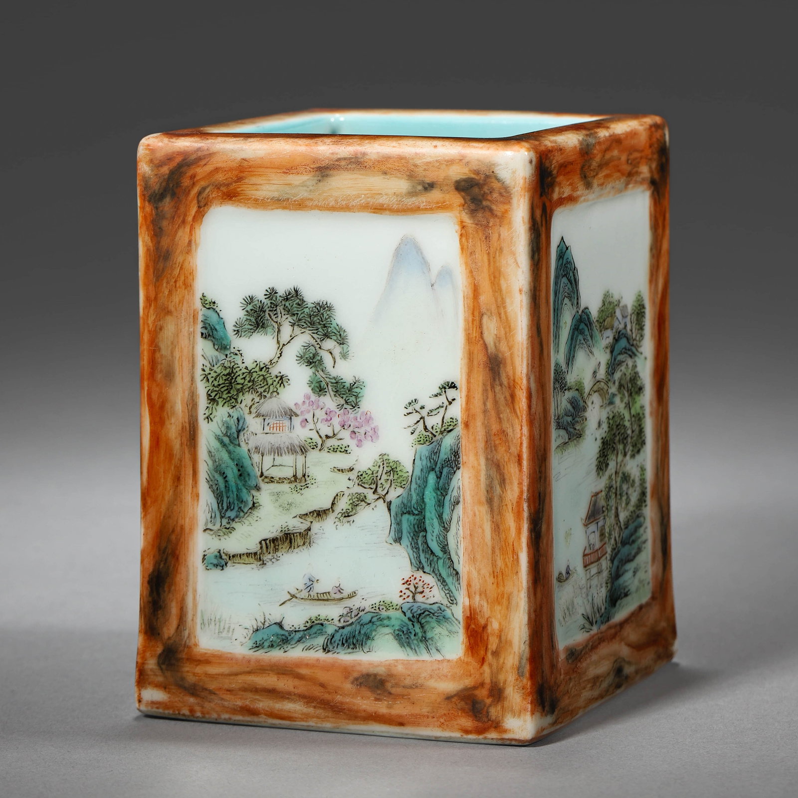 A FAUX-BOIS-GLAZED MEDALLION BRUSH POT: A FAUX-BOIS-GLAZED MEDALLION BRUSH POT Length: 3 1/4 in. (8.3 cm), Width: 3 1/4 in. (8.3 cm), Height: 4 5/16 in. (11 cm)
