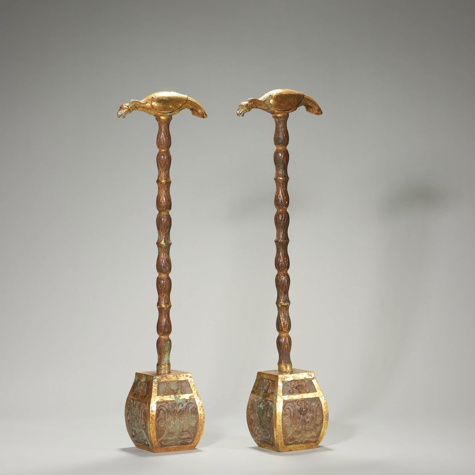 A GILT-BRONZE AND JADE-INSET WINE VESSEL: A GILT-BRONZE AND JADE-INSET WINE VESSEL Height: 17 13/16 in. (45.3 cm)