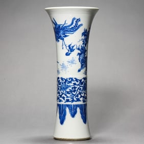 A BLUE AND WHITE 'MYTHICAL BEAST' GU VASE