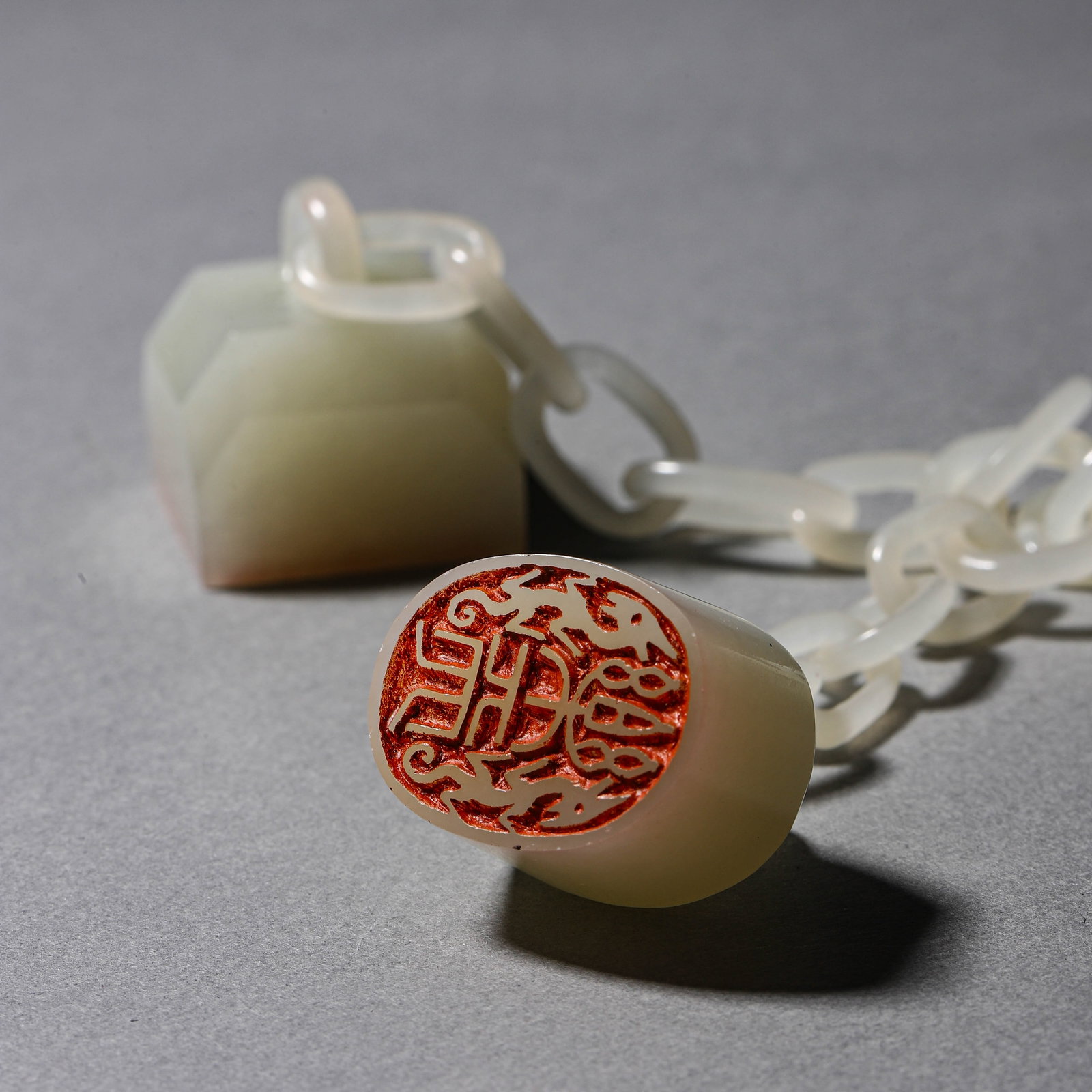 A WHITE JADE CHAINED TRIPLE SEAL - 4