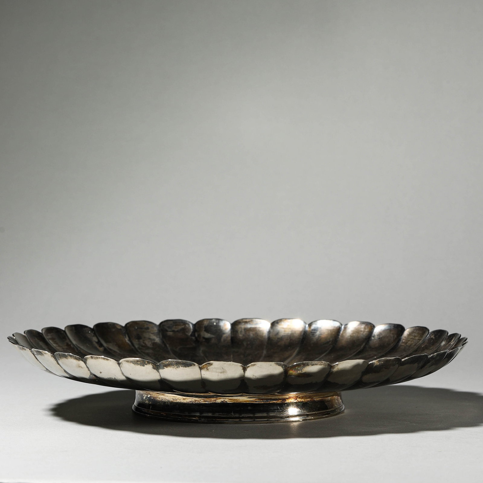 A SILVER DISH: A SILVER DISH Diameter: 11 1/4 in. (28.5 cm)