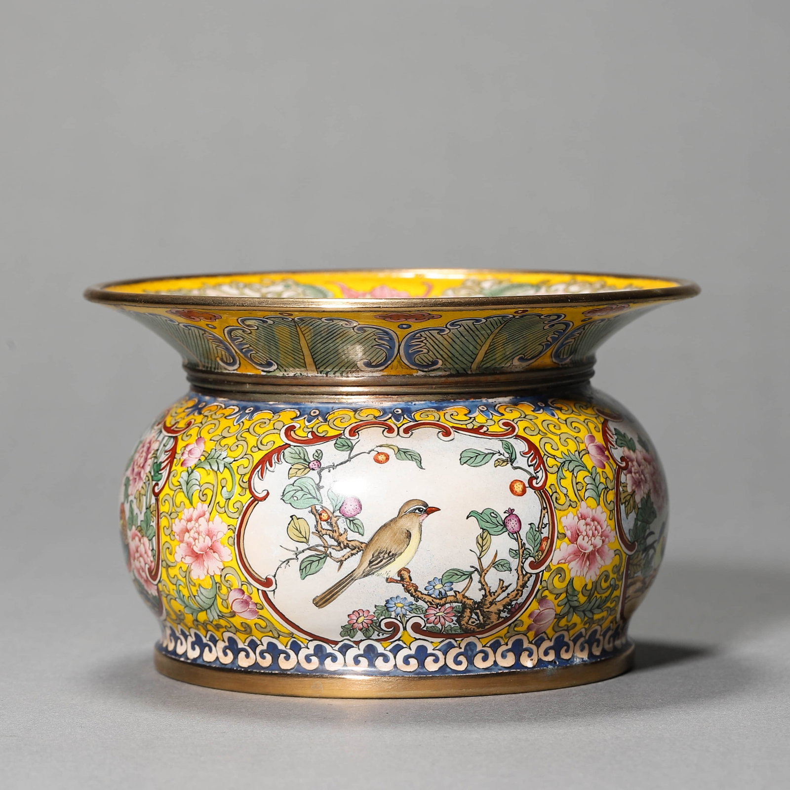 A COPPER ENAMEL SPITTOON: A COPPER ENAMEL SPITTOON Height: 2 15/16 in. (7.4 cm), Diameter: 4 1/2 in. (11.5 cm)