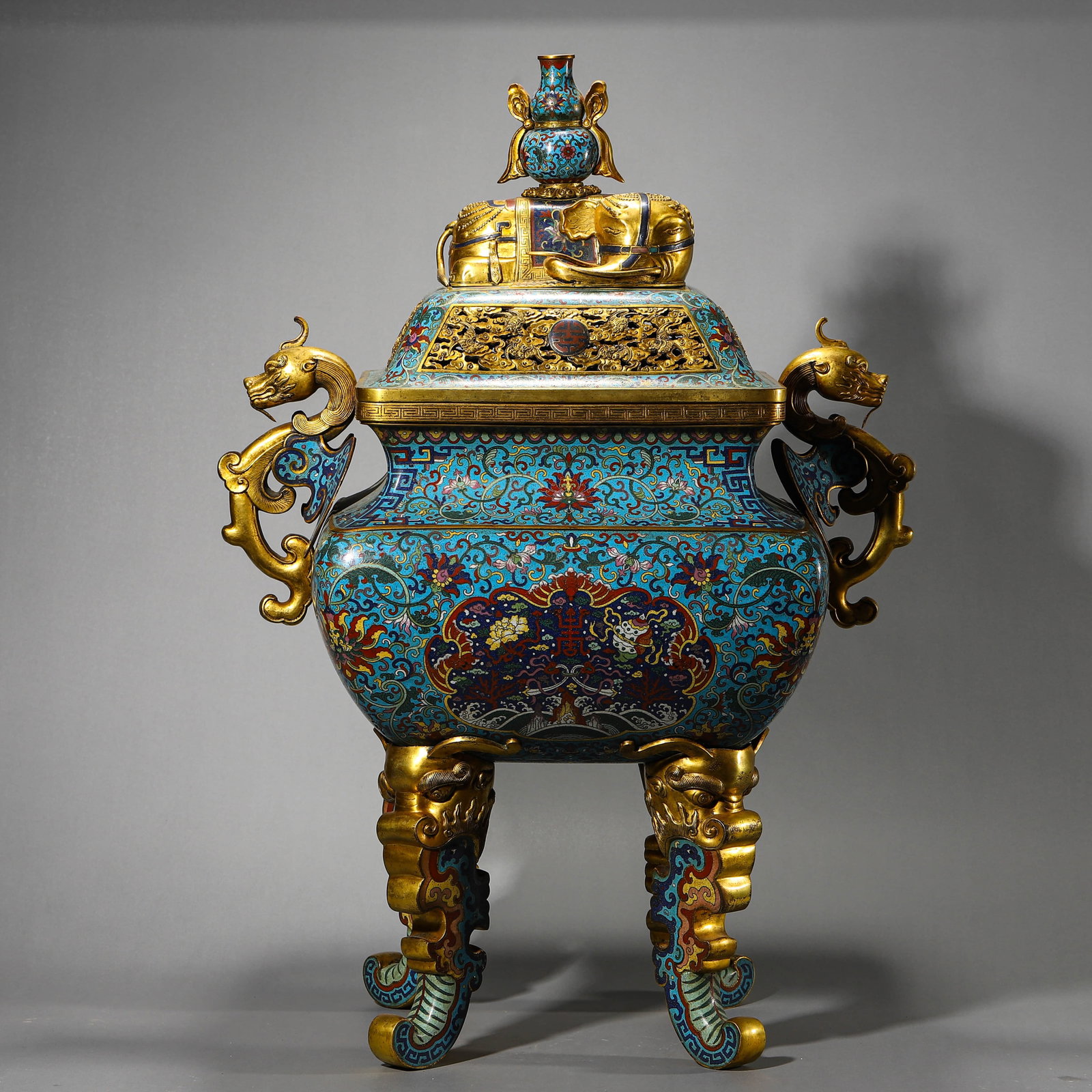 A CLOISONNÉ ENAMEL DOUBLE-HANDLE FOUR-FOOT CENSER: A CLOISONNÉ ENAMEL DOUBLE-HANDLE FOUR-FOOT CENSER Height: 33 1/16 in. (84 cm), Length: 21 5/8 in. (55 cm), Width: 16 15/16 in. (43 cm)