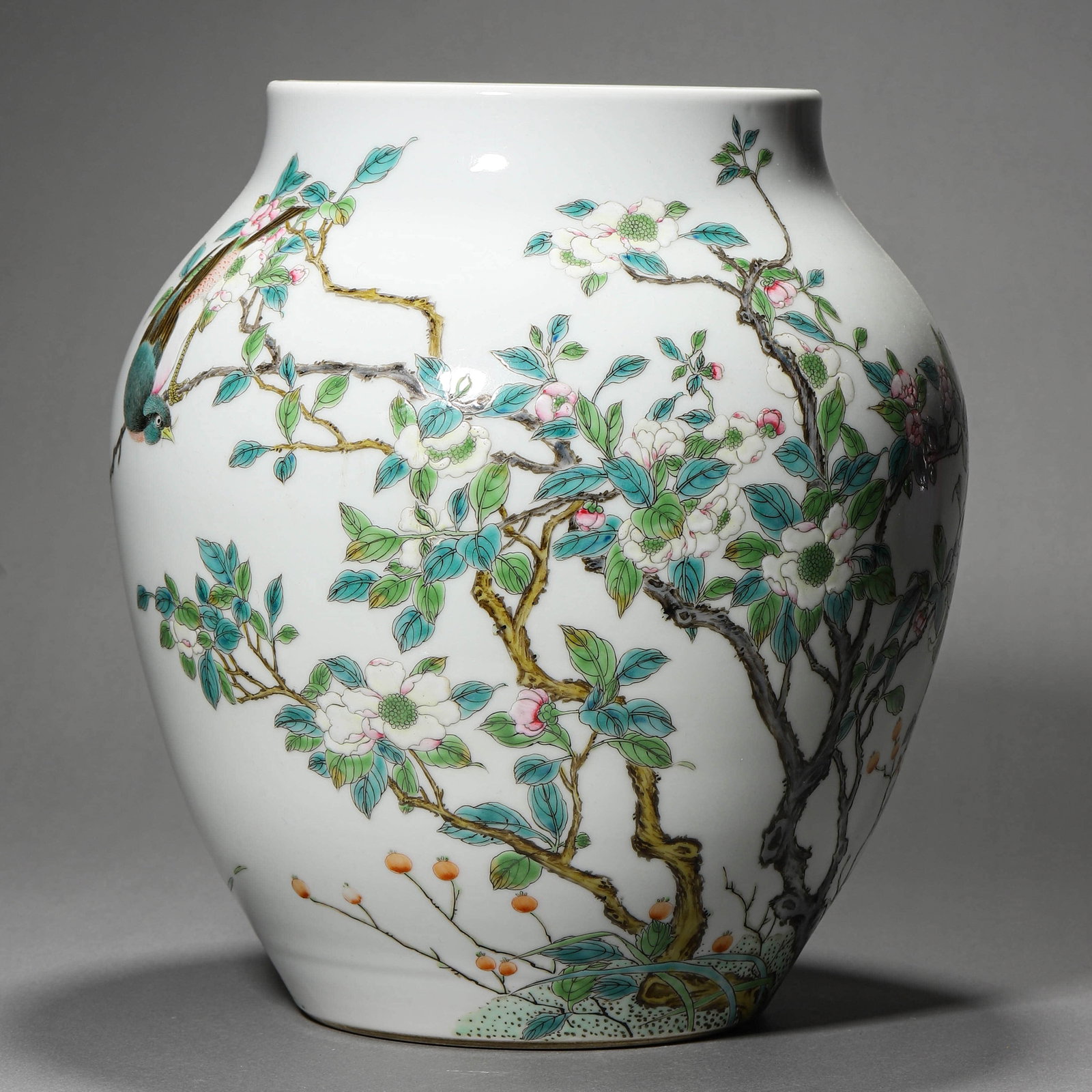 A FAMILLE ROSE 'MAGPIE AND BLOSSOM' JAR: A FAMILLE ROSE 'MAGPIE AND BLOSSOM' JAR Height: 11 in. (28 cm)