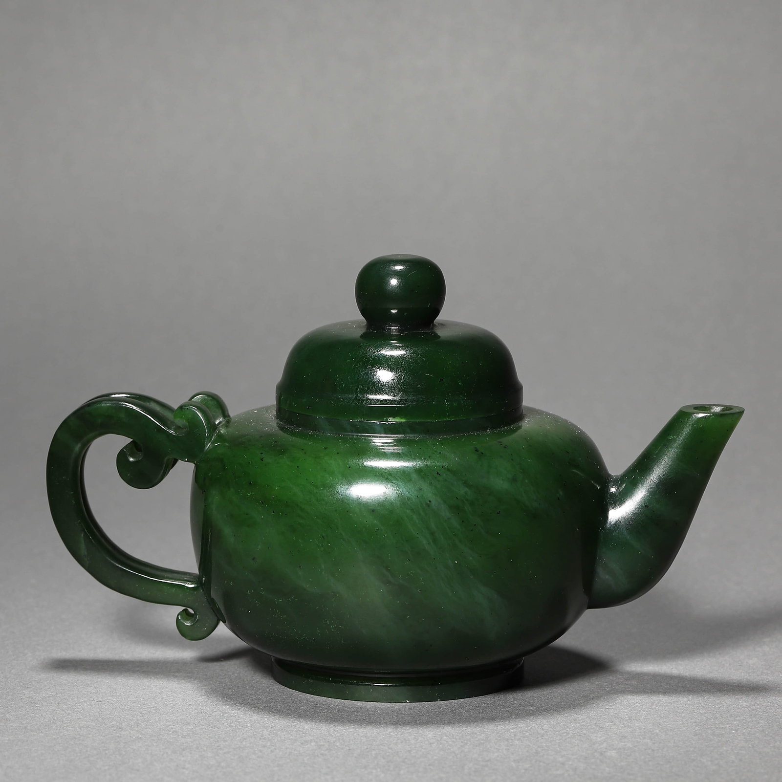 A JADEITE EWER: A JADEITE EWER Length: 6 1/8 in. (15.5 cm), Height: 3 5/8 in. (9.3 cm)