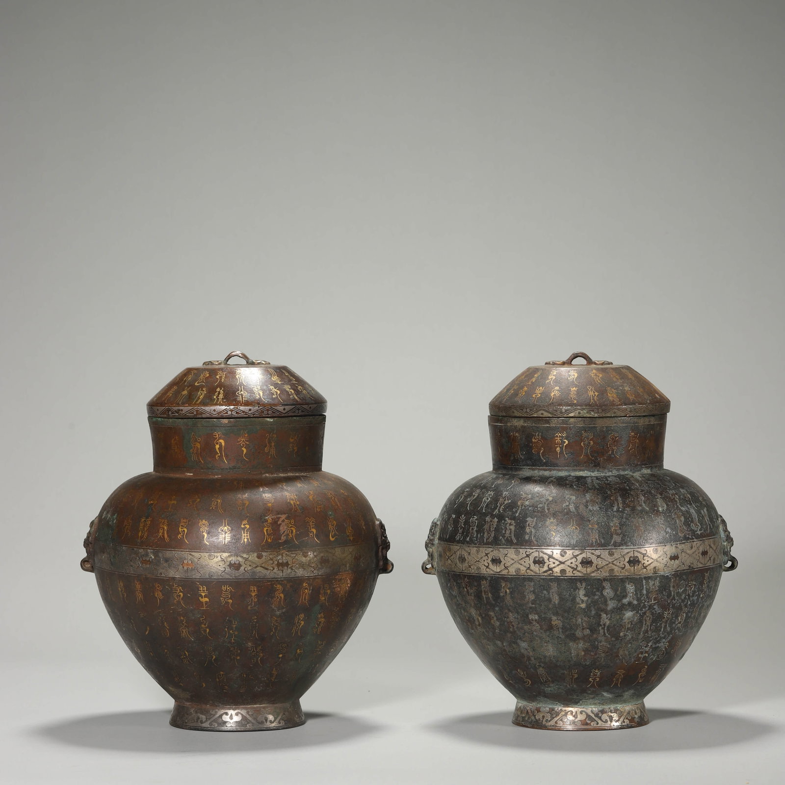 A GROUP OF GOLD-INLAID VESSELS: A GROUP OF GOLD-INLAID VESSELS Height: 8 7/16 in. (21.5 cm)