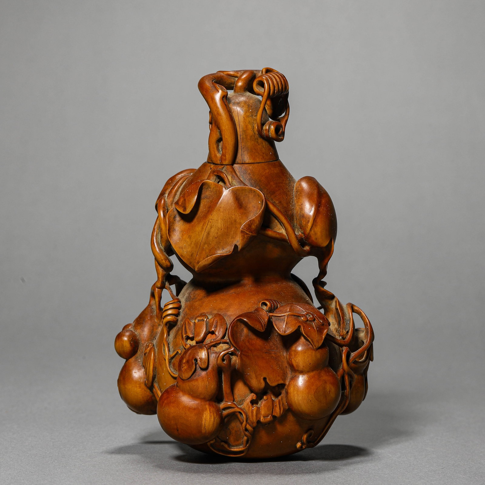 A BOXWOOD GOURD-SHAPED 'WANDAI' DECORATIVE PIECE: A BOXWOOD GOURD-SHAPED 'WANDAI' DECORATIVE PIECE Height: 5 11/16 in. (14.5 cm)
