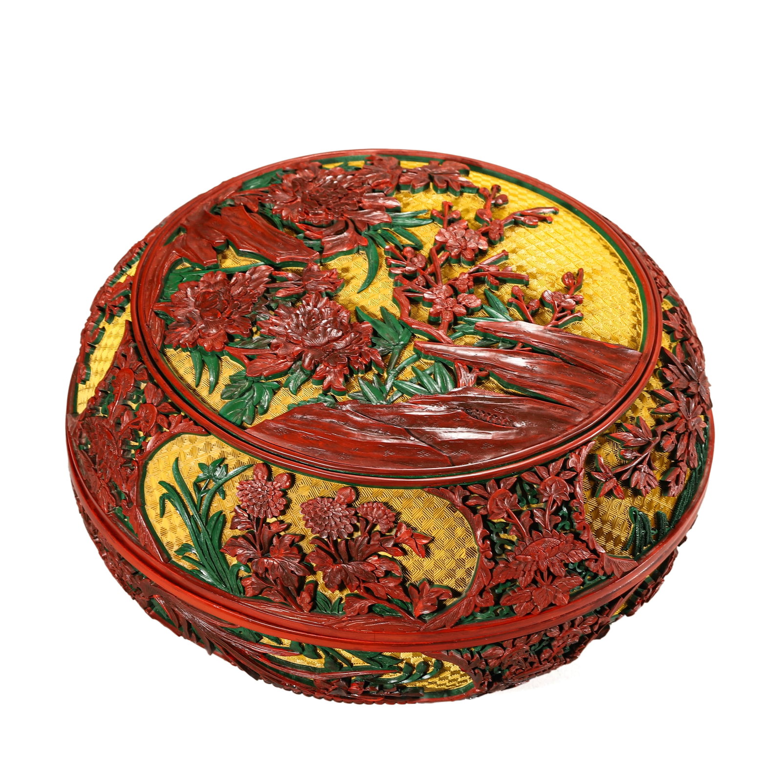 A CARVED CINNABAR LACQUER COVERED BOX: A CARVED CINNABAR LACQUER COVERED BOX Diameter: 10 1/4 in. (26 cm), Height: 6 1/8 in. (15.5 cm)