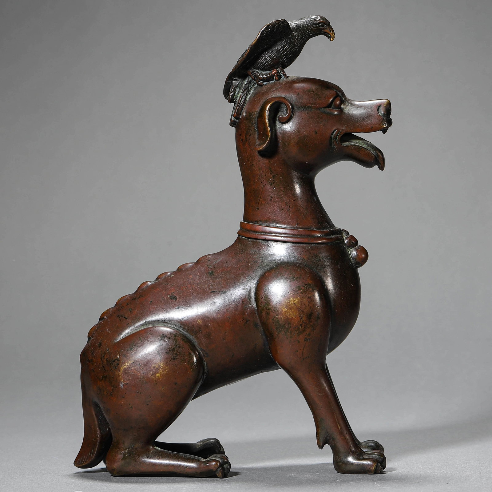 A BRONZE BEAST FIGURE: A BRONZE BEAST FIGURE Height: 7 7/8 in. (20 cm), Length: 8 1/4 in. (21 cm)