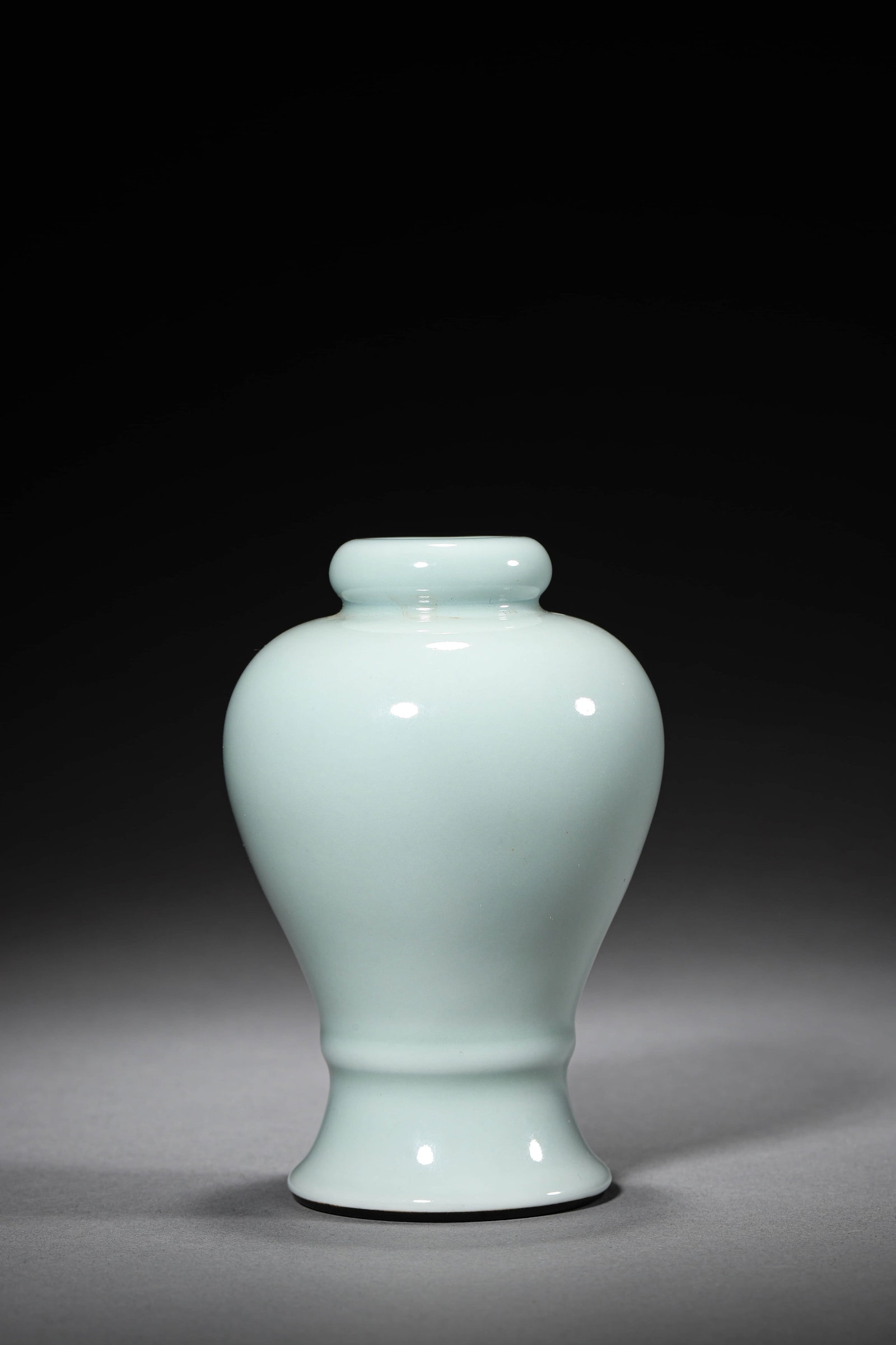 A CELADON-GLAZED GARLIC-HEAD SHAPED MEIPING: A CELADON-GLAZED GARLIC-HEAD SHAPED MEIPING Height: 5 1/8 in. (13 cm), Diameter: 3 1/8 in. (8 cm)