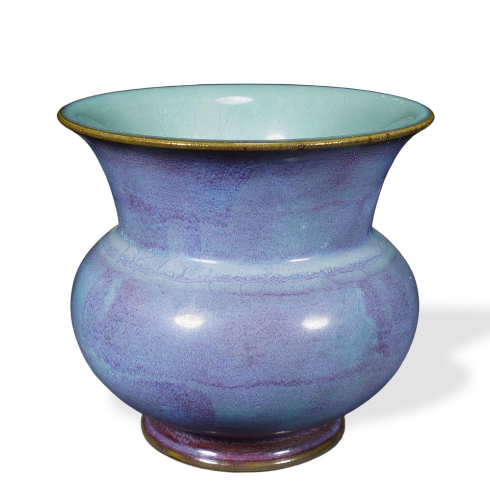 JUN WARE ROSE-PURPLE GLAZED ZHADOU-FORM FLOWER POT: 7 1/2 x 8 1/8 in (19 x 20.5 cm) Jun Ware Rose-Purple Glazed Zhadou-Form Flower Pot Dimensions: D: 8 1/8 in (20.5 cm); H: 7 1/2 in (19 cm) This impressive flower pot exemplifies the supreme aesthetic o
