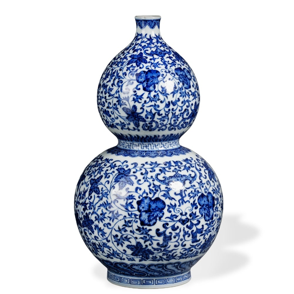 QIANLONG BLUE AND WHITE 'FLORAL SCROLL' GOURD-SHAPED VASE (1 of 5)