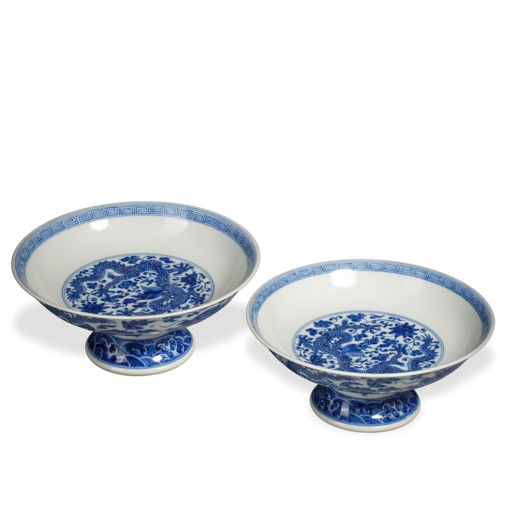 PAIR OF QIANLONG BLUE AND WHITE 'DRAGON AMONG FLOWERS' STEM DISHES: 2 3/4 x 6 3/4 in (7 x 17 cm) Pair of Qianlong Blue and White 'Dragon Among Flowers' Stem Dishes Dimensions: D: 6 3/4 in (17 cm); H: 2 3/4 in (7 cm) This refined pair of stem dishes (gaozupan)