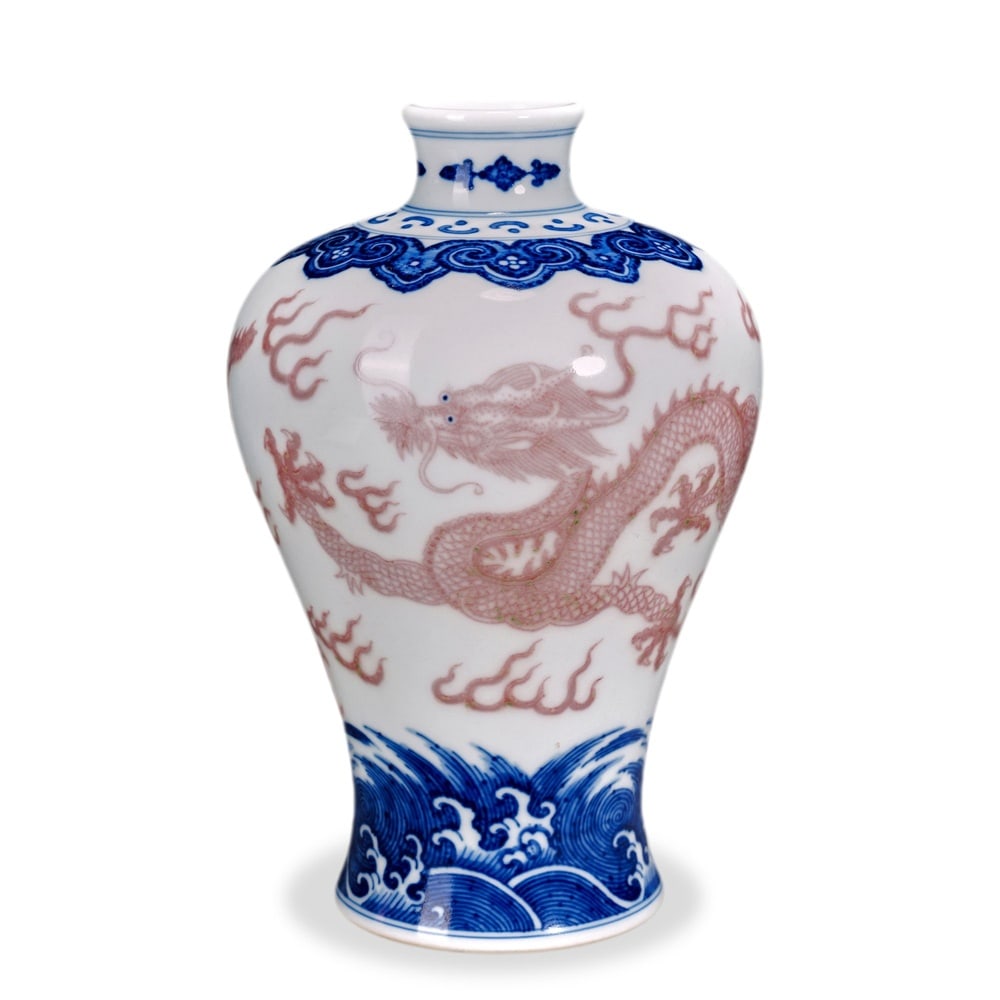 QIANLONG BLUE AND WHITE AND COPPER-RED 'SEA DRAGON' MEIPING: 7 1/8 x 4 in (18 x 10 cm) Qianlong Blue and White and Copper-Red 'Sea Dragon' Meiping Dimensions: H: 7 in (18 cm); W: 4 in (10 cm) This refined small meiping exemplifies the technical ambition of Qian