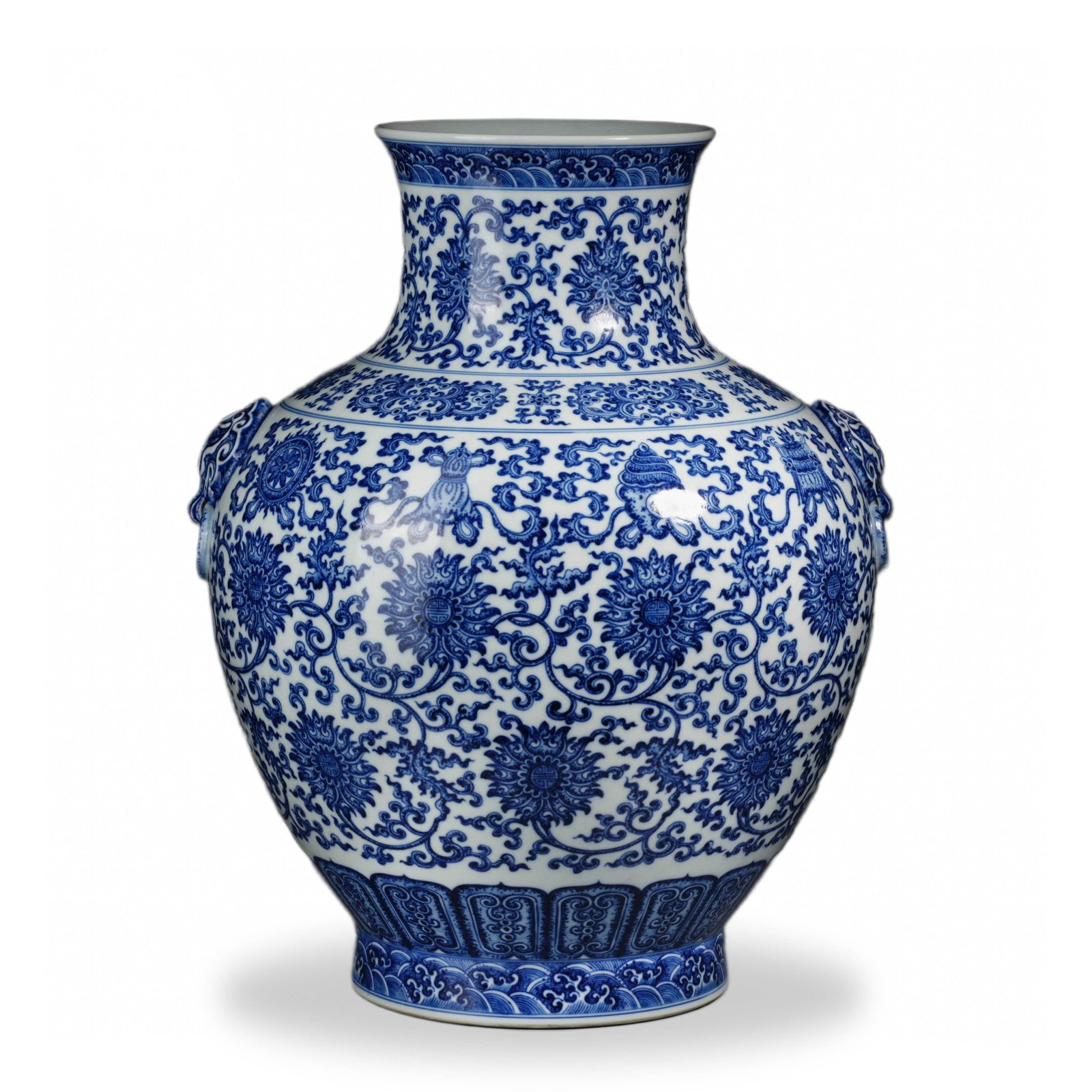QIANLONG BLUE AND WHITE 'LOTUS SCROLL AND EIGHT BUDDHIST TREASURES' ZUN WITH ANIMAL-MASK HANDLES (1 of 3)
