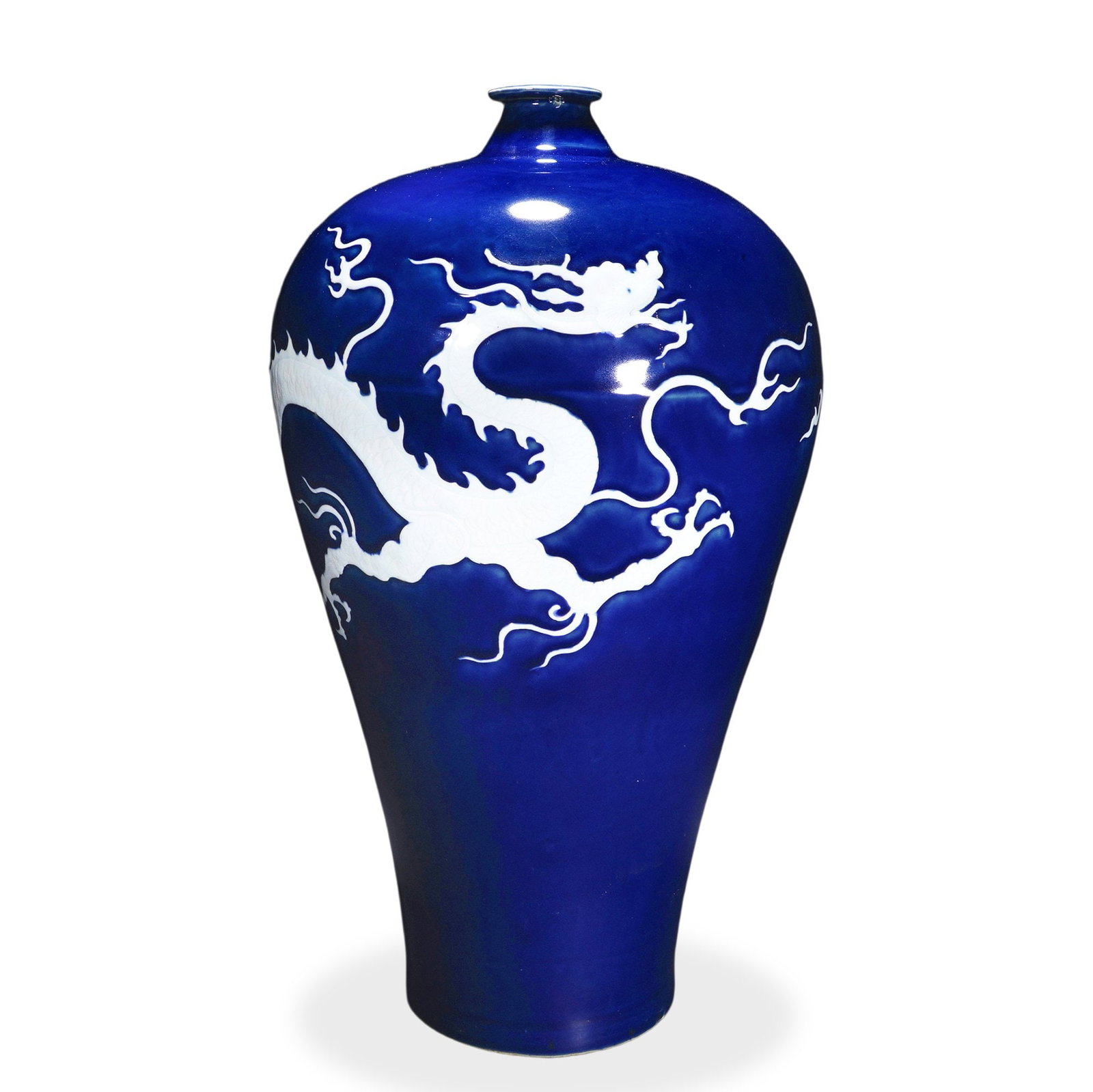 YUAN DYNASTY SACRIFICIAL-BLUE GLAZED MEIPING WITH WHITE DRAGON DESIGN: 16 7/8 x 9 in (43 x 23 cm) Yuan Dynasty Sacrificial-Blue Glazed Meiping with White Dragon Design Dimensions: H: 16 7/8 in (43 cm); W: 9 in (23 cm) This commanding meiping (literally 'plum vase')