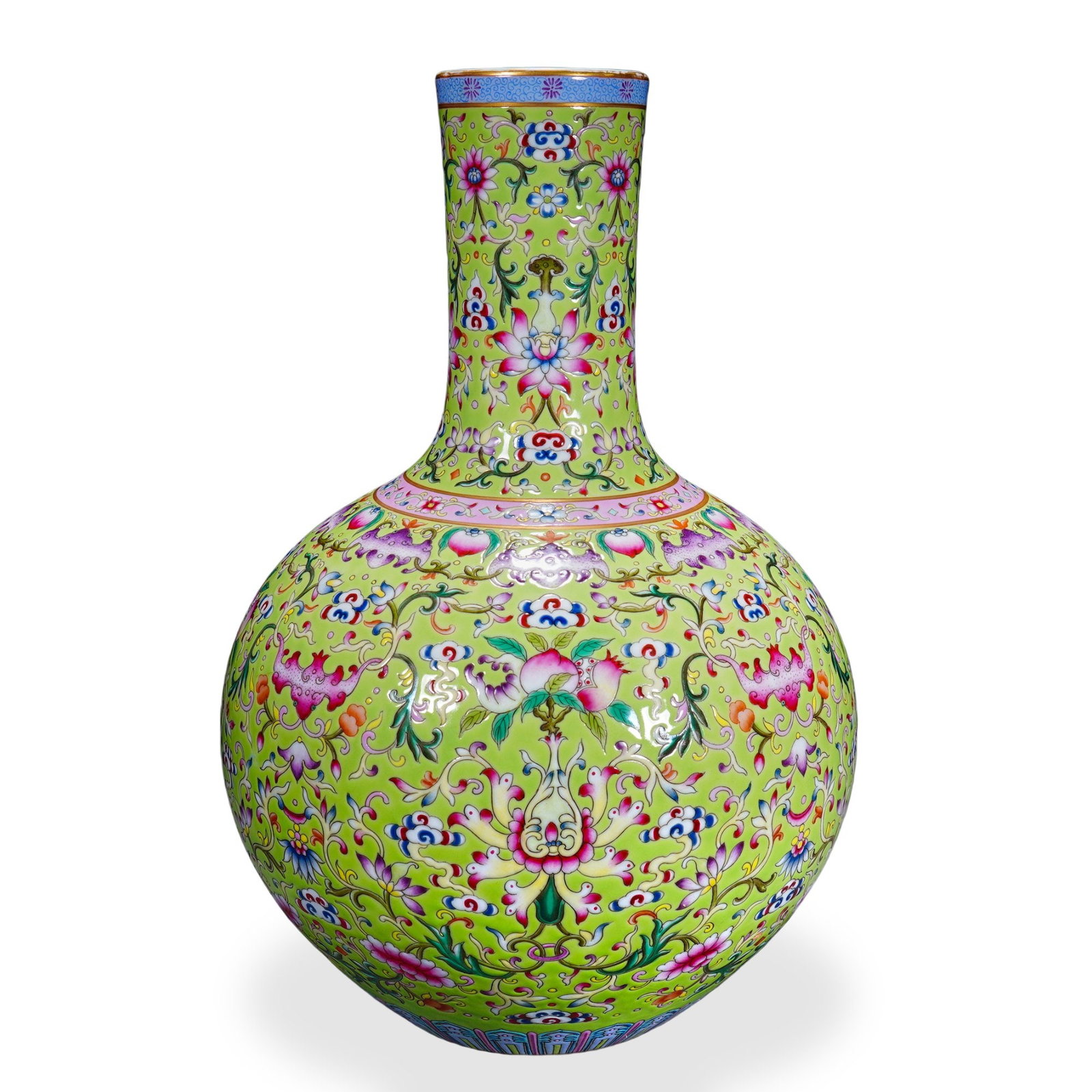 QIANLONG FAMILLE ROSE 'CONTINUOUS BLESSINGS AND LONGEVITY' TIANQIUPING ON GREEN GROUND: 13 x 9 in (33 x 23 cm) Qianlong Famille Rose 'Continuous Blessings and Longevity' Tianqiuping on Green Ground Dimensions: H: 13 in (33 cm); W: 9 in (23 cm) This commanding heavenly-globe vase
