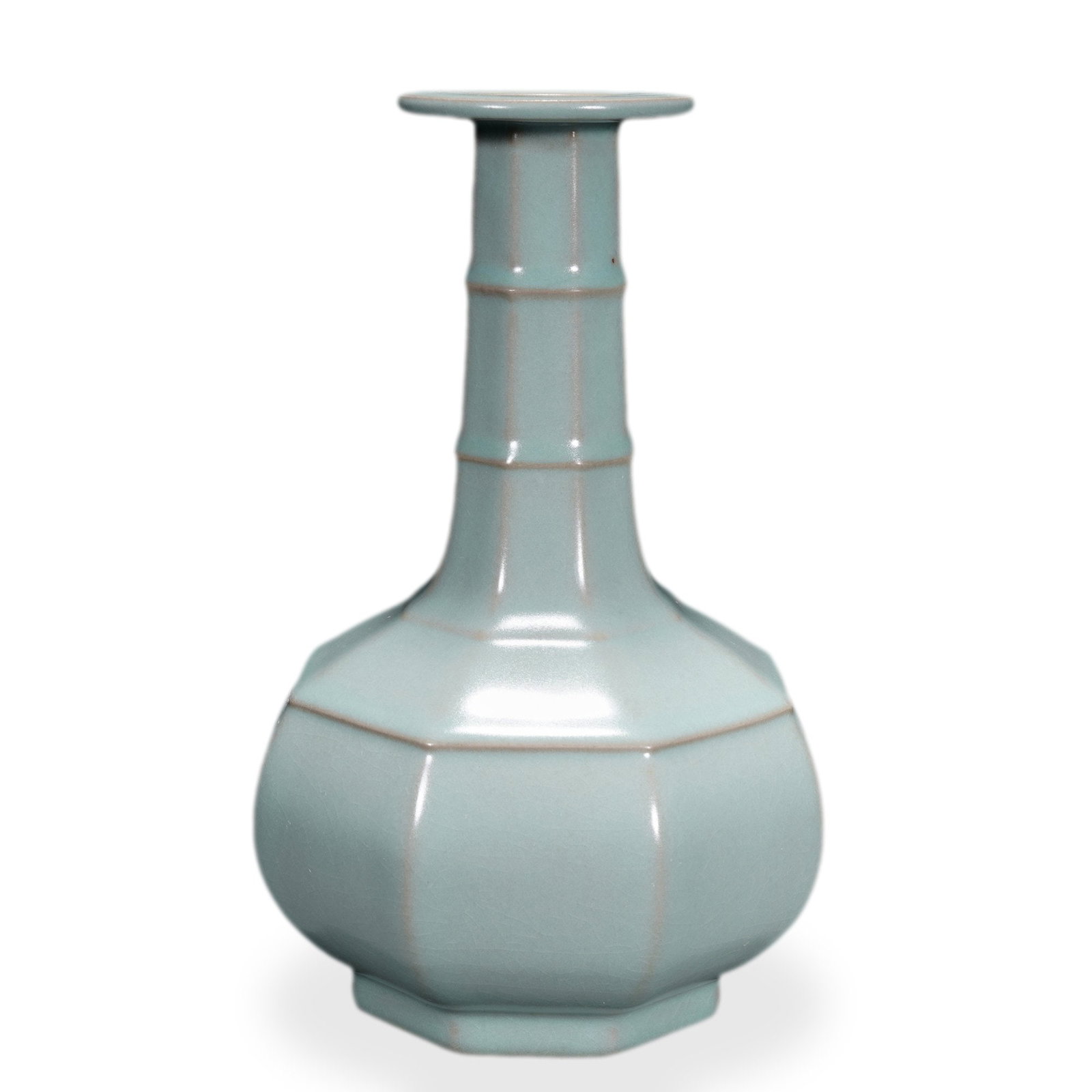 SONG DYNASTY RU WARE SKY-BLUE GLAZED OCTAGONAL VASE WITH RAISED BOWSTRING BANDS: 8 7/8 x 5 7/8 in (22.5 x 15 cm) Song Dynasty Ru Ware Sky-Blue Glazed Octagonal Vase with Raised Bowstring Bands Dimensions: H: 8 7/8 in (22.5 cm); W: 5 7/8 in (15 cm) This rare and refined octagonal v