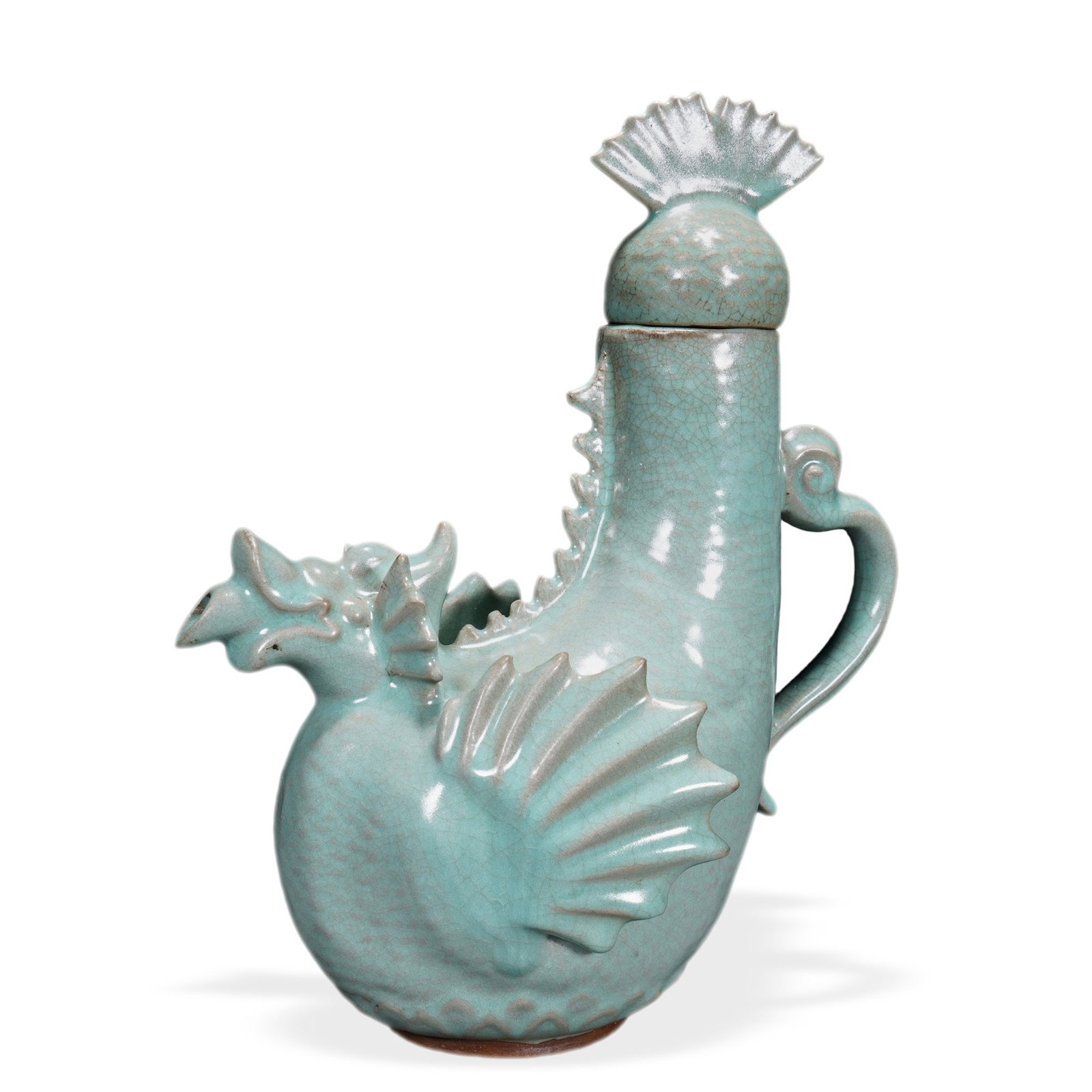SONG DYNASTY RU WARE POWDER-GREEN GLAZED DRAGON-MOUTH EWER: 11 3/8 x 9 7/8 in (29 x 25 cm) Song Dynasty Ru Ware Powder-Green Glazed Dragon-Mouth Ewer Dimensions: H: 11 3/8 in (29 cm); W: 9 7/8 in (25 cm) This rare and sculptural ewer exemplifies the supreme