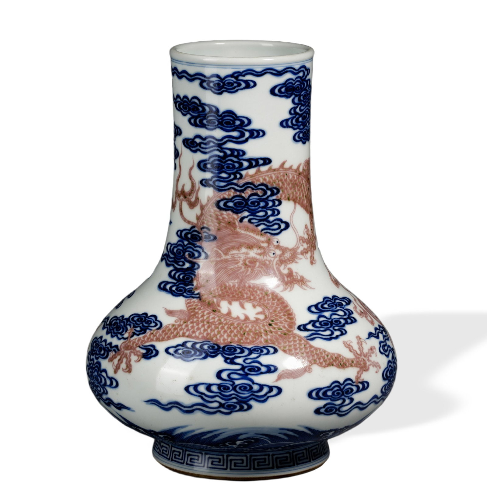 QIANLONG UNDERGLAZE BLUE AND COPPER-RED 'DRAGONS AMONG AUSPICIOUS CLOUDS' WIDE-BELLIED VASE (1 of 3)