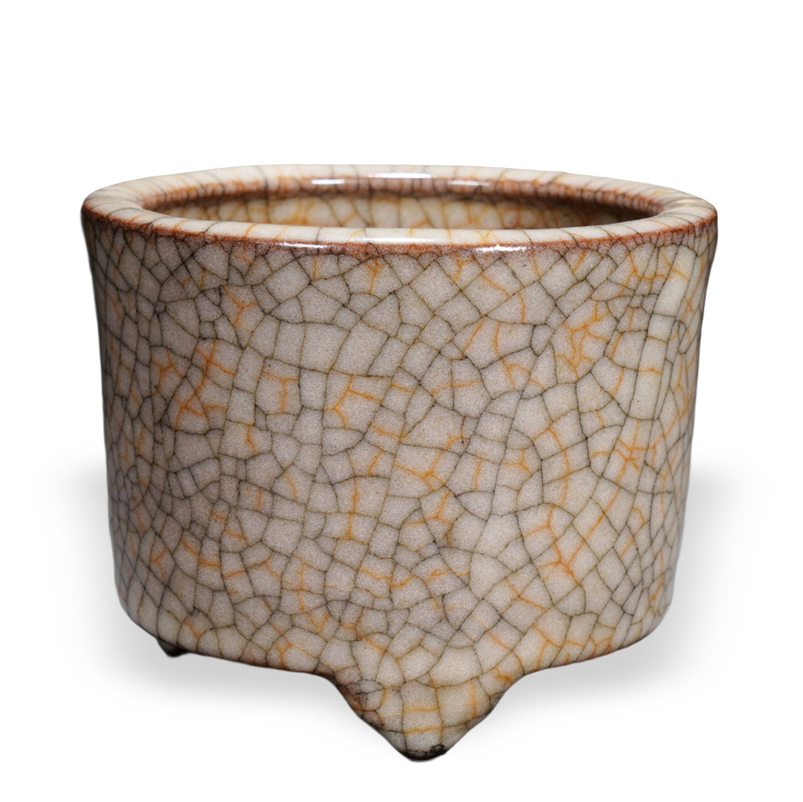 SONG DYNASTY GE WARE CRACKLE-GLAZED TRIPOD CENSER: Song Dynasty Ge Ware Crackle-Glazed Tripod Censer Dimensions: H: 3 1/2 in (9 cm); W: 4 3/4 in (12 cm) This understated tripod censer embodies the contemplative aesthetic of Song dynasty Ge ware, one