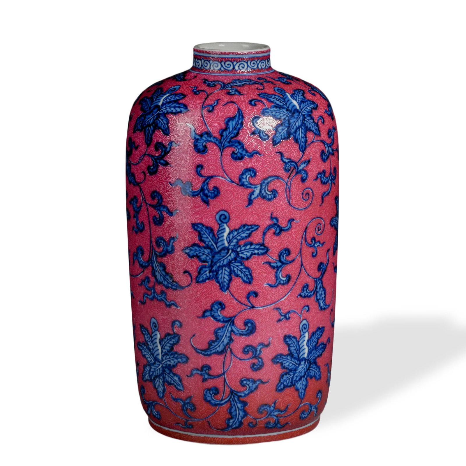 YONGZHENG BLUE AND WHITE AND RUBY-RED SGRAFFIATO 'MEIPING': 9 7/8 x 4 3/4 in (25 x 12 cm) Yongzheng Blue and White and Ruby-Red Sgraffiato 'Meiping' Dimensions: H: 9 7/8 in (25 cm); W: 4 3/4 in (12 cm) This refined meiping exemplifies the supreme refinement