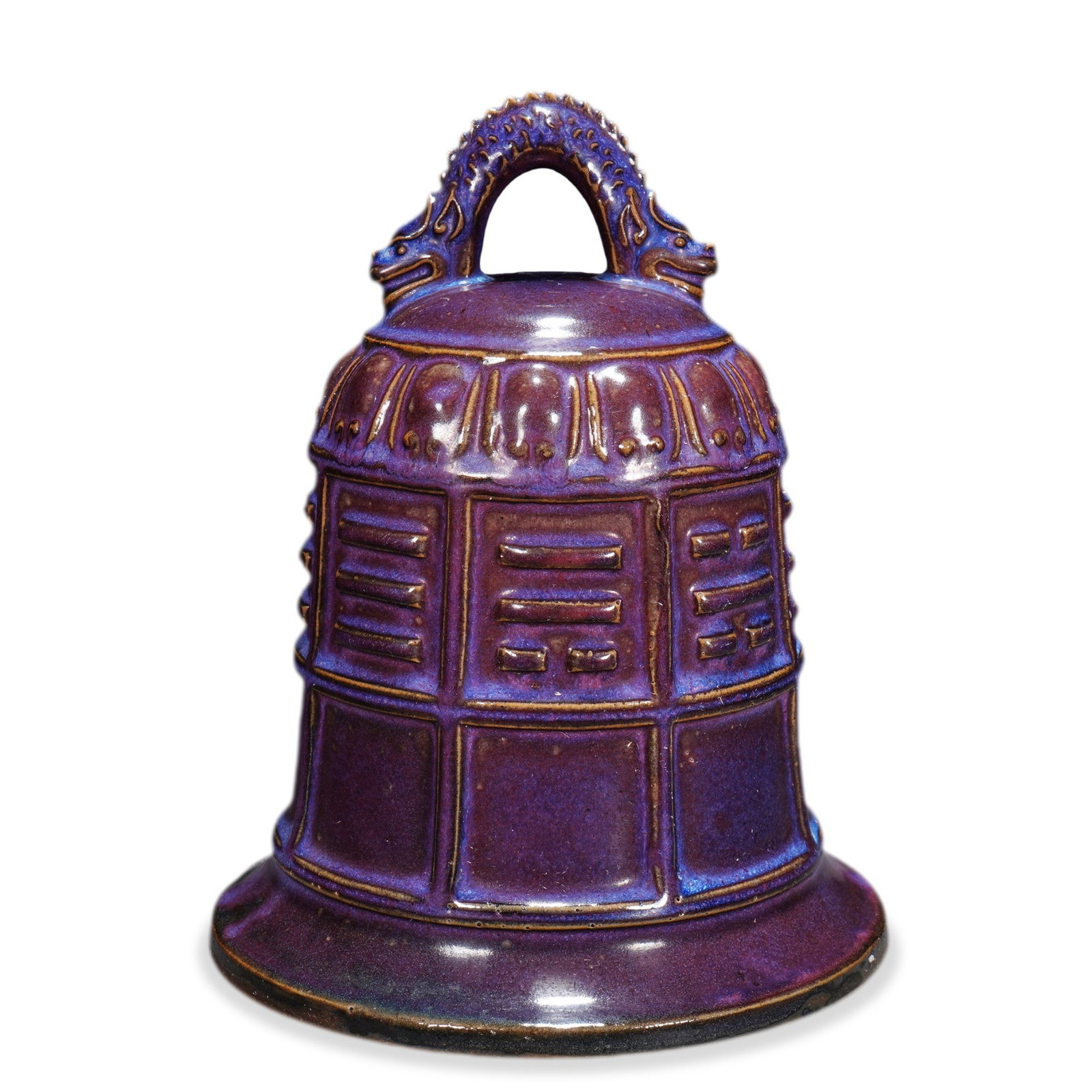 SONG DYNASTY JUN WARE AUBERGINE-PURPLE GLAZED BELL: 8 5/8 x 6 3/4 in (22 x 17 cm) Song Dynasty Jun Ware Aubergine-Purple Glazed Bell Dimensions: H: 8 5/8 in (22 cm); W: 6 3/4 in (17 cm) This rare and sculpturally distinctive bell (bianzhong)