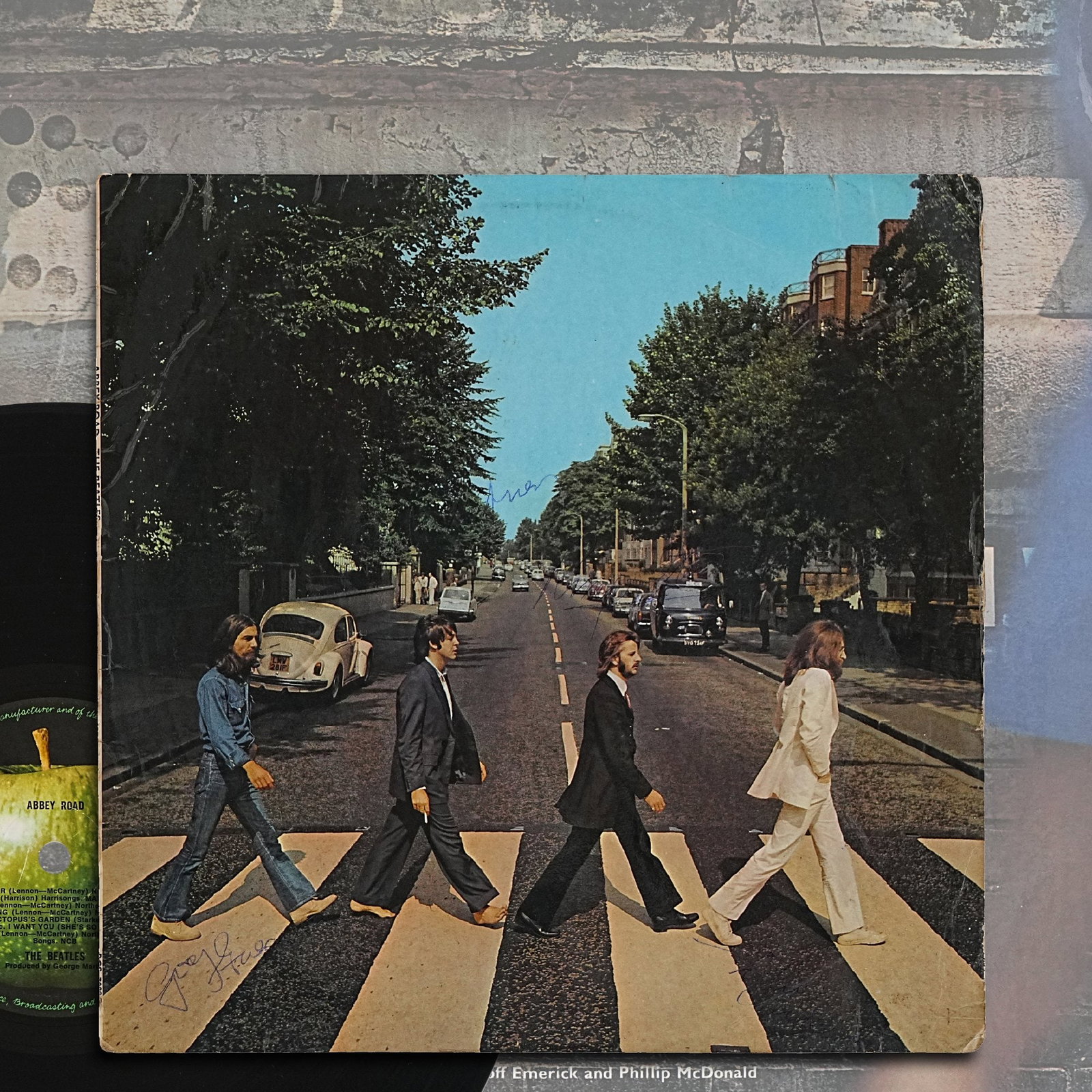 THE BEATLES FULLY SIGNED ABBEY ROAD LP: 12 1/4 x 12 1/4 Provenance and Authentication: This collectible has undergone a rigorous forensic evaluation. The signatures were carefully analyzed across multiple criteria, including ink deposition,