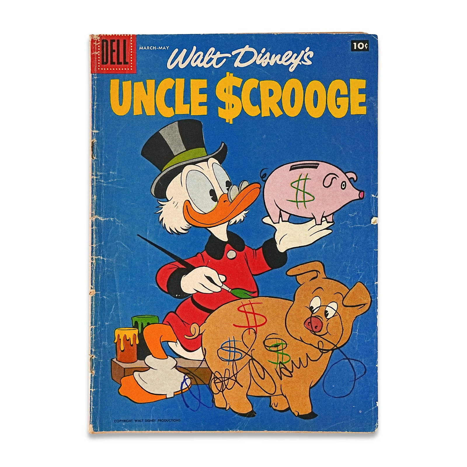 WALT DISNEY SIGNED "UNCLE SCROOGE" DELL COMIC (MID-CENTURY ISSUE): 10 1/4 x 7 1/4 in (26 x 18.5 cm) A signed copy of Walt Disney's Uncle Scrooge represents a highly desirable and visually compelling example of Disney memorabilia, combining one of the most beloved