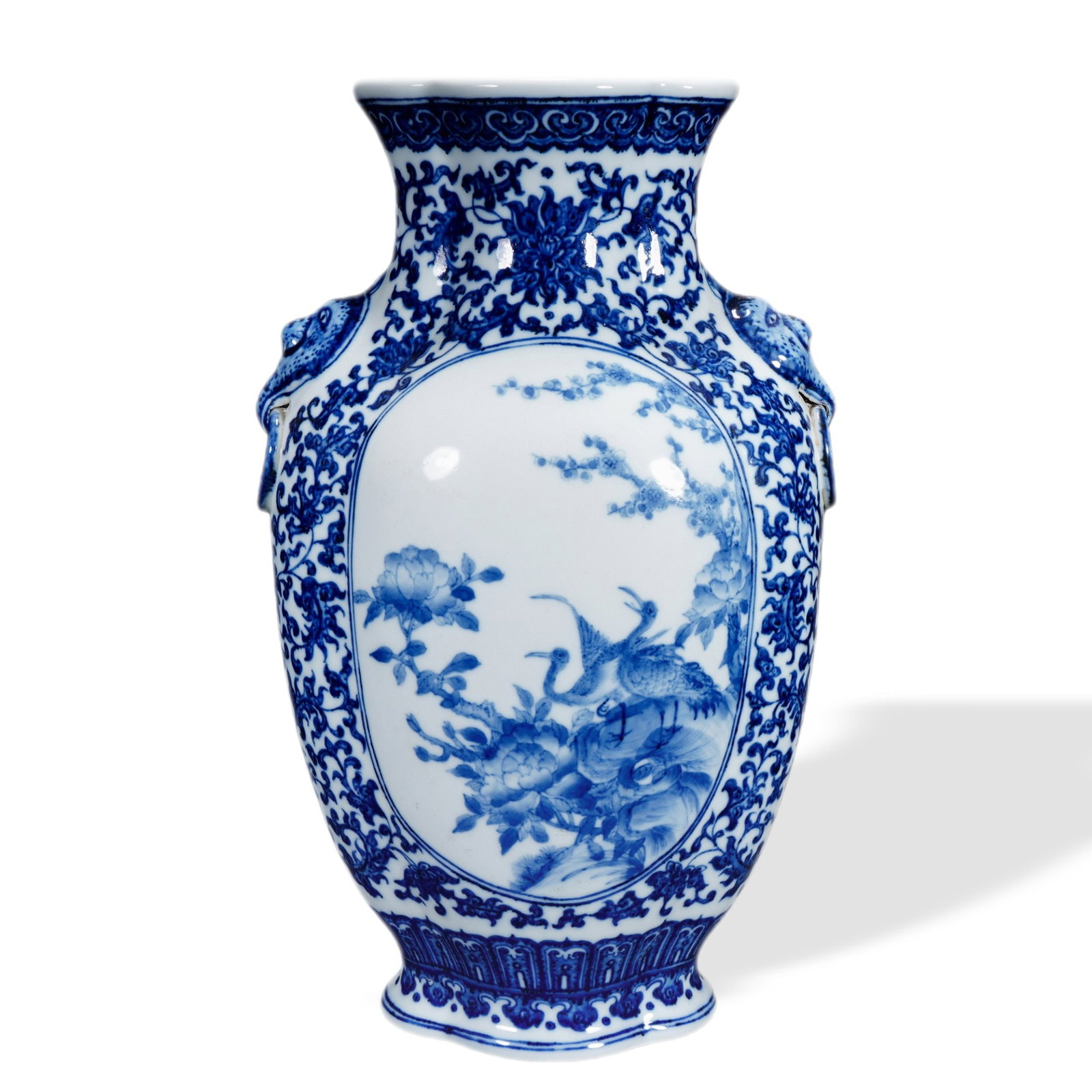 YONGZHENG BLUE AND WHITE 'MAGPIES ON PLUM' TWIN-ANIMAL-HANDLED FLOWER-MOUTH VASE WITH CARTOUCHES: 12 1/4 x 7 1/8 in (31 x 18 cm) Yongzheng Blue and White 'Magpies on Plum' Twin-Animal-Handled Flower-Mouth Vase with Cartouches Dimensions: H: 12 1/4 in (31 cm); W: 7 1/8 in (18 cm) This refined vase