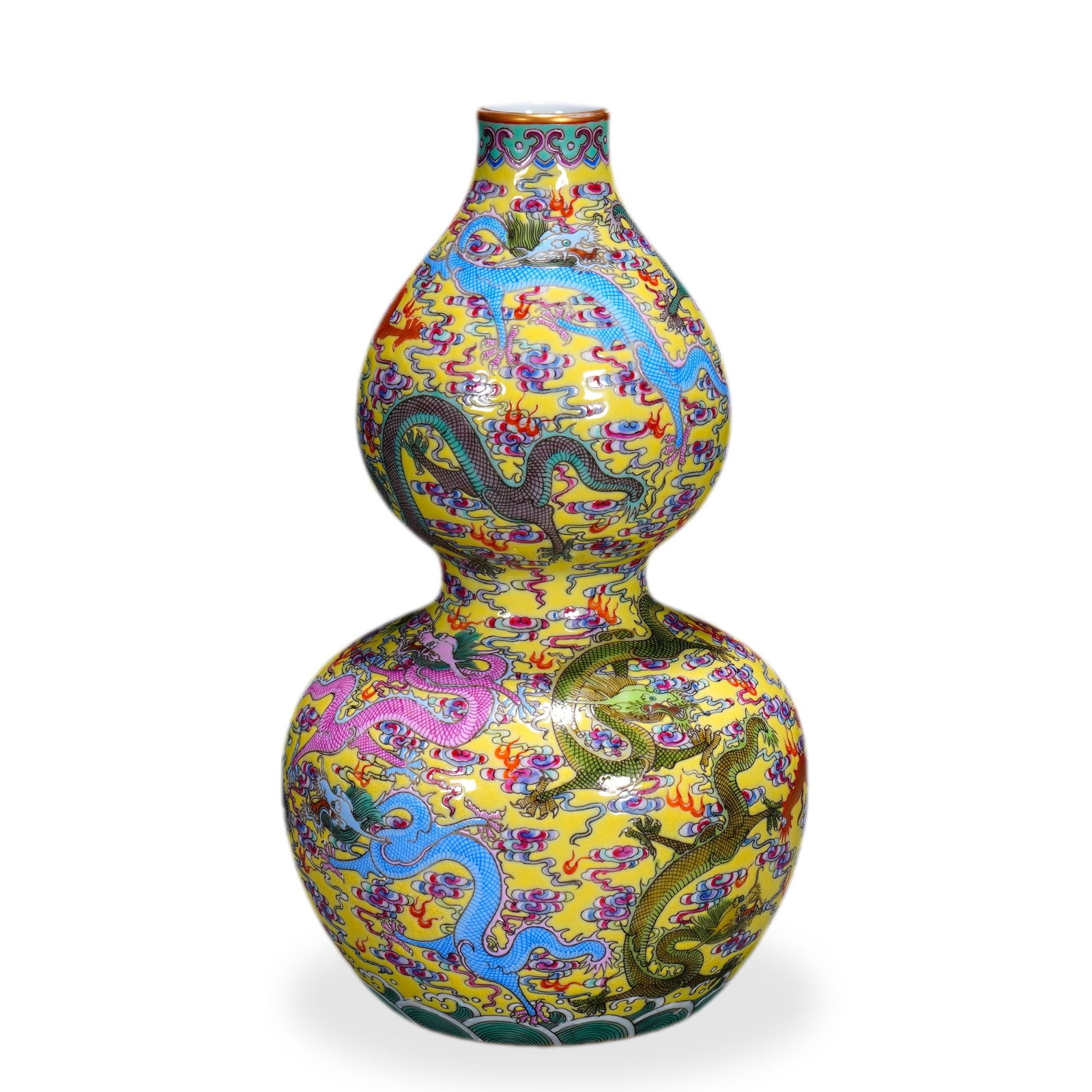 YONGZHENG FAMILLE ROSE 'DRAGON' GOURD-SHAPED VASE WITH GILT HIGHLIGHTS ON YELLOW GROUND: 6 3/4 x 3 1/2 in (17 x 9 cm) Yongzheng Famille Rose 'Dragon' Gourd-Shaped Vase with Gilt Highlights on Yellow Ground Dimensions: H: 6 3/4 in (17 cm); W: 3 1/2 in (9 cm) This refined small