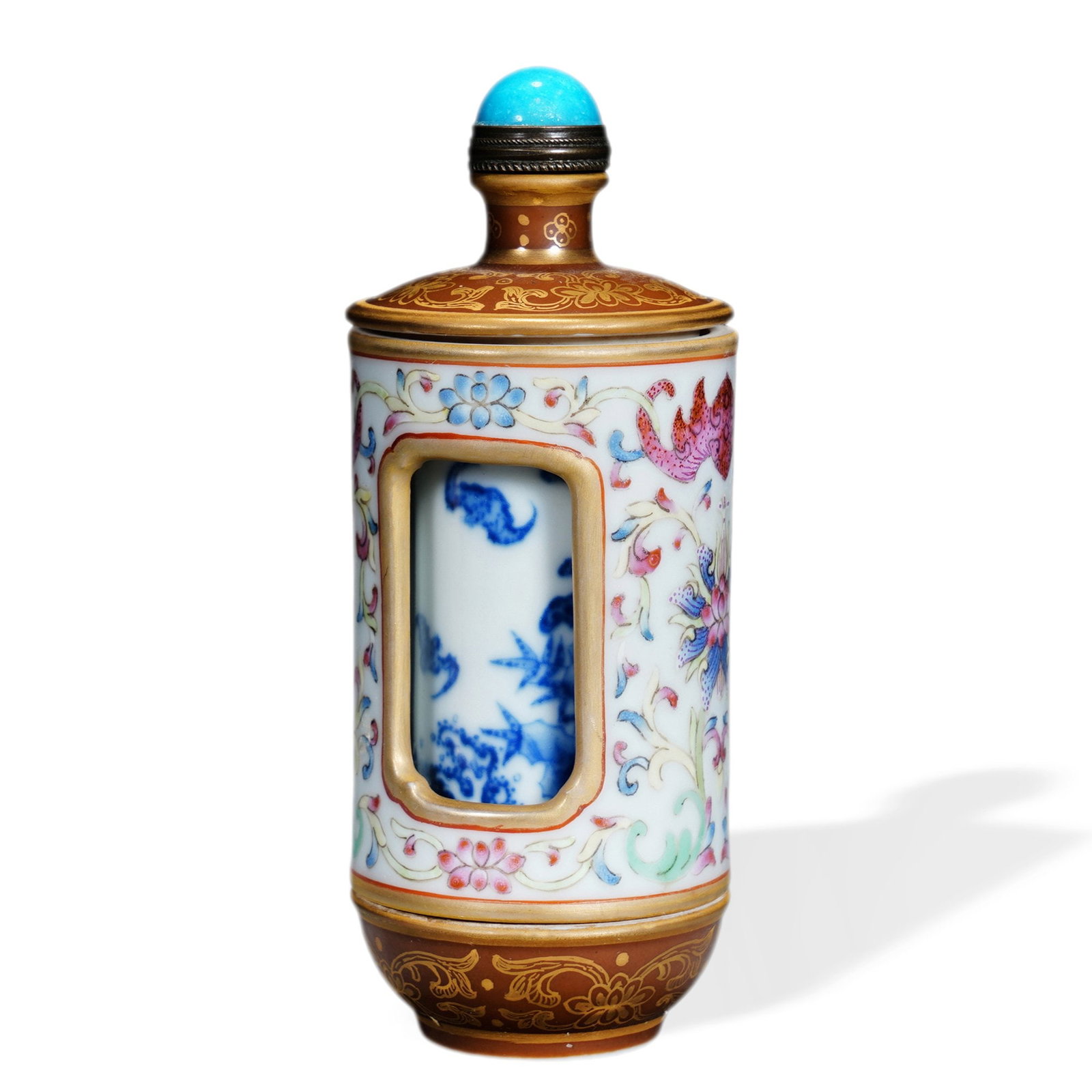QIANLONG FAMILLE ROSE 'LOTUS AND BLESSING' SNUFF BOTTLE WITH UNDERGLAZE BLUE REVOLVING INNER: 4 x 1 5/8 in (10 x 4 cm) Qianlong Famille Rose 'Lotus and Blessing' Snuff Bottle with Underglaze Blue Revolving Inner Compartment Dimensions: H: 4 in (10 cm); W: 1 5/8 in (4 cm) This exceptional snuff