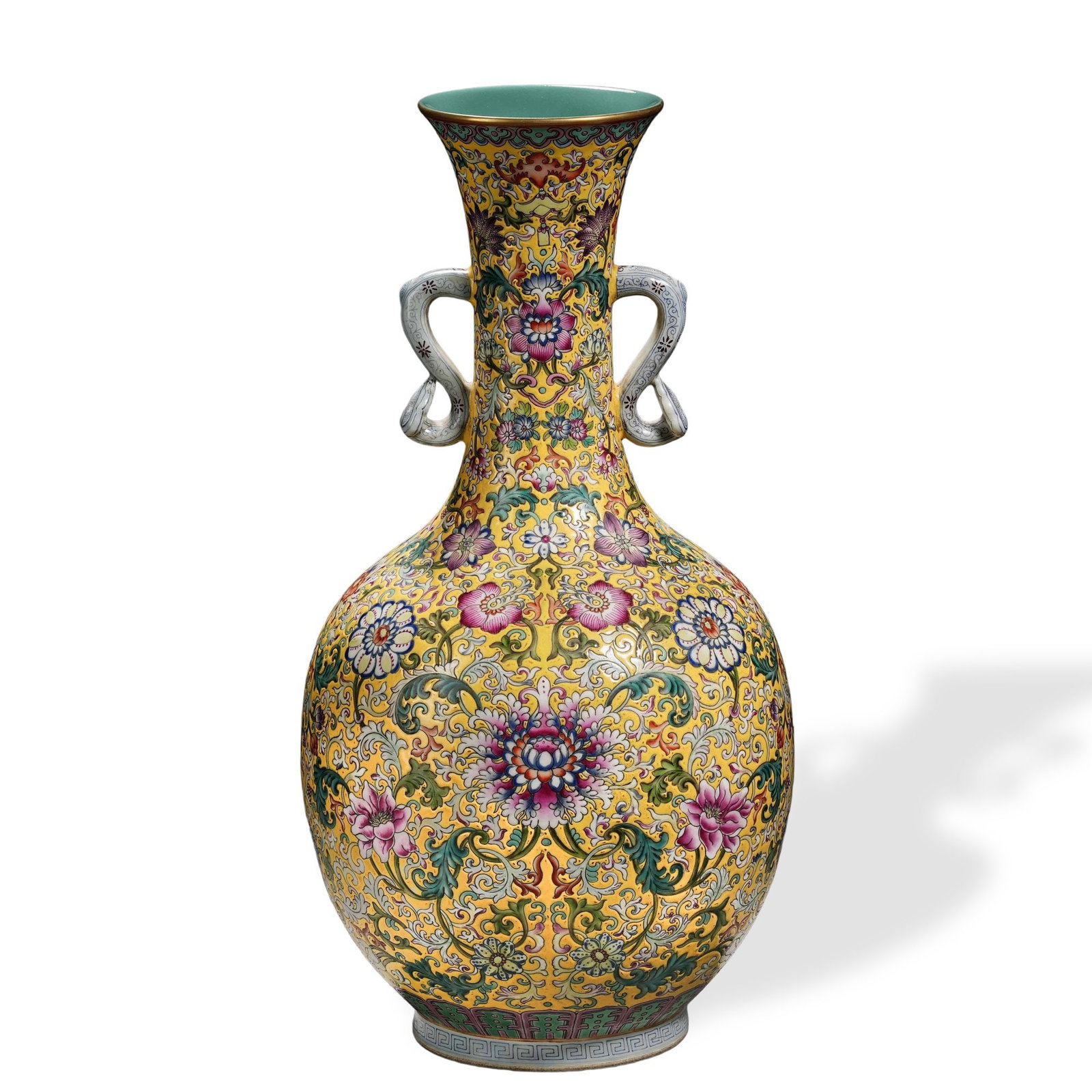 QIANLONG FAMILLE ROSE 'LOTUS SCROLL' RUYI-HANDLED VASE ON YELLOW GROUND (1 of 5)