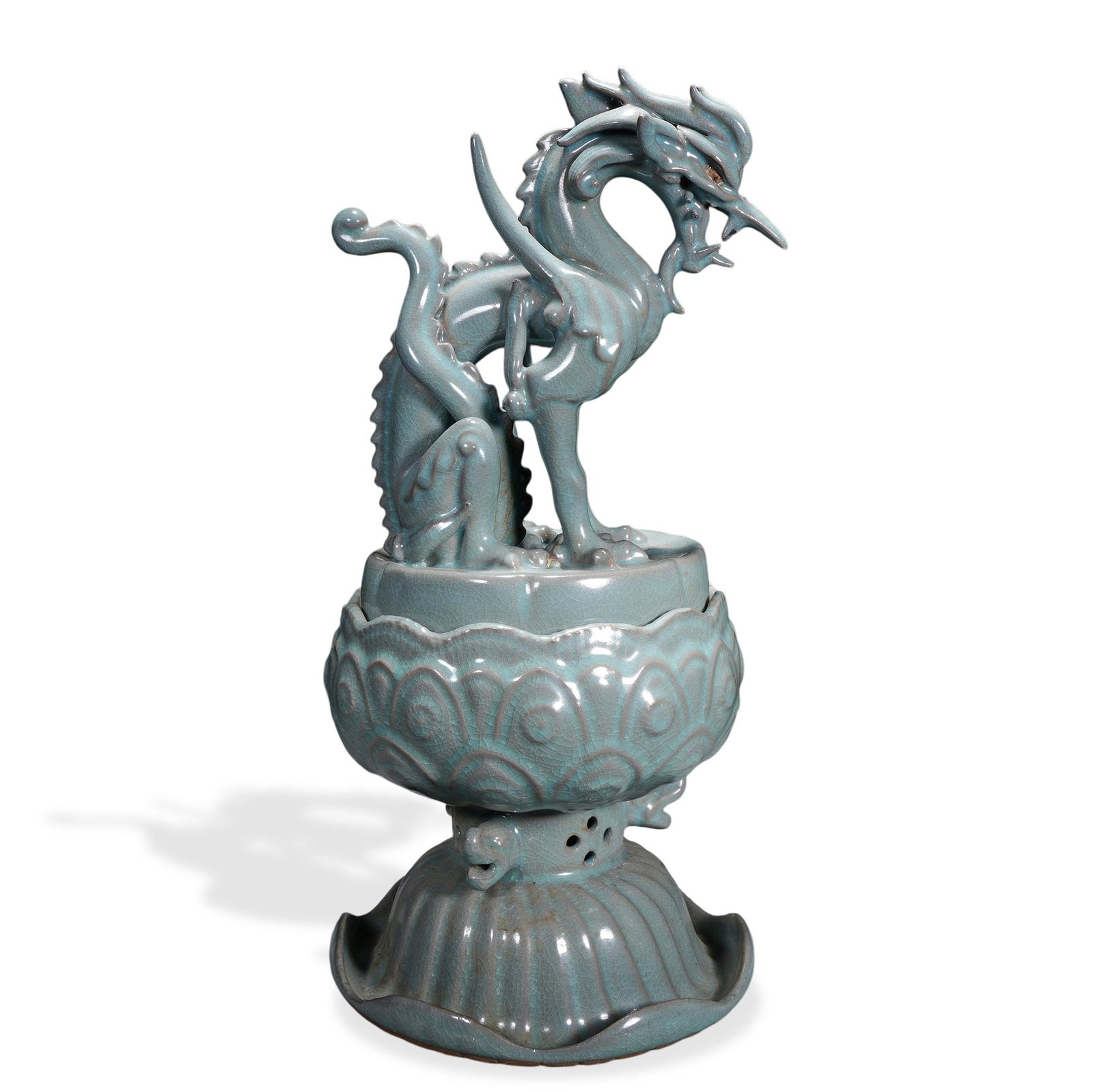 SONG DYNASTY RU WARE SKY-BLUE GLAZED DRAGON-HEAD AND LOTUS-THRONE INCENSE BURNER: 14 5/8 x 6 7/8 in (37 x 17.5 cm) Song Dynasty Ru Ware Sky-Blue Glazed Dragon-Head and Lotus-Throne Incense Burner Dimensions: H: 14 1/2 in (37 cm); W: 6 7/8 in (17.5 cm) This rare and sculptural