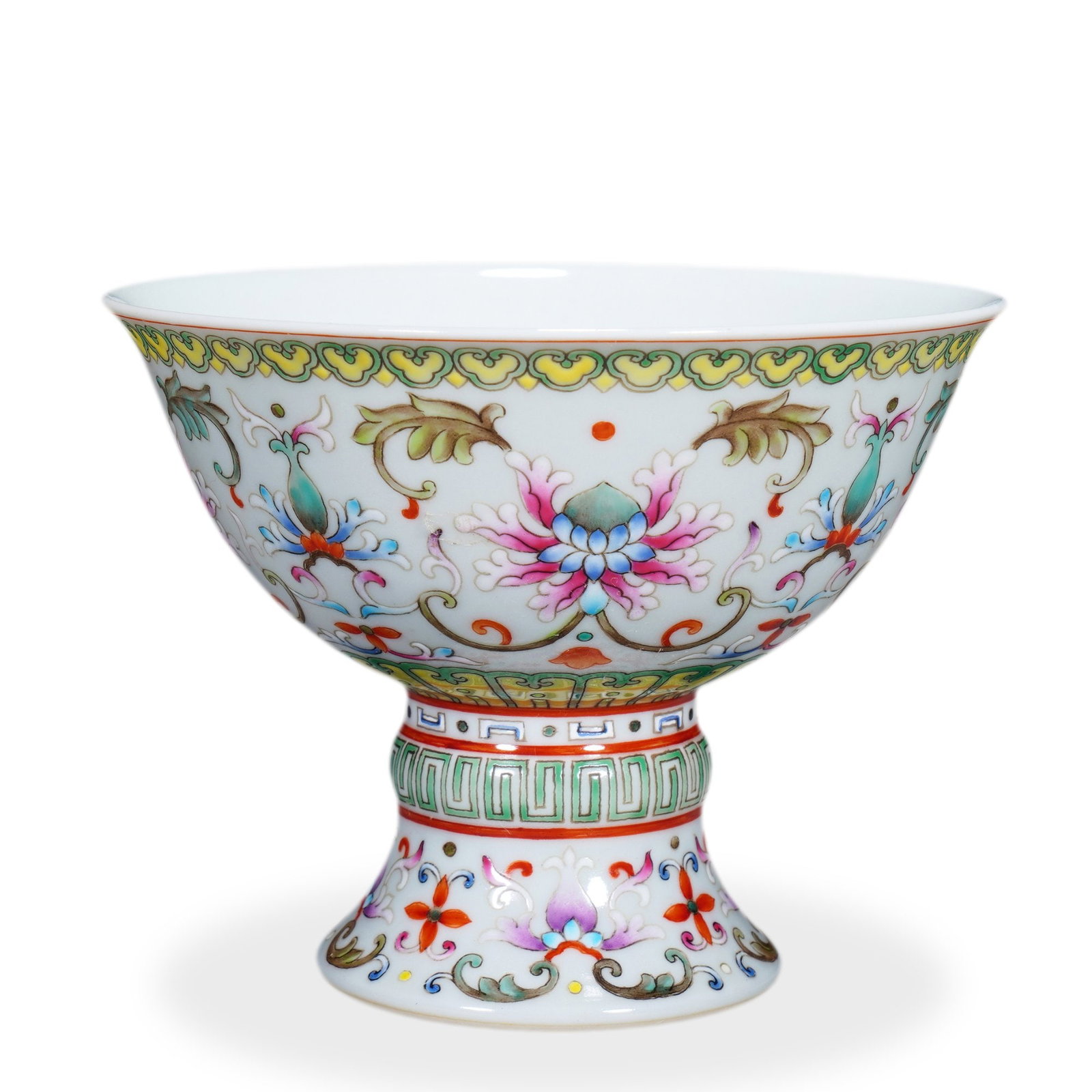 QIANLONG FAMILLE ROSE 'LOTUS SCROLL' STEM BOWL: 3 1/2 x 4 1/2 in (9 x 11.5 cm) Qianlong Famille Rose 'Lotus Scroll' Stem Bowl Dimensions: H: 3 1/2 in (9 cm); D: 4 1/2 in (11.5 cm) This refined stem bowl (gaozuwan) exemplifies the precision of