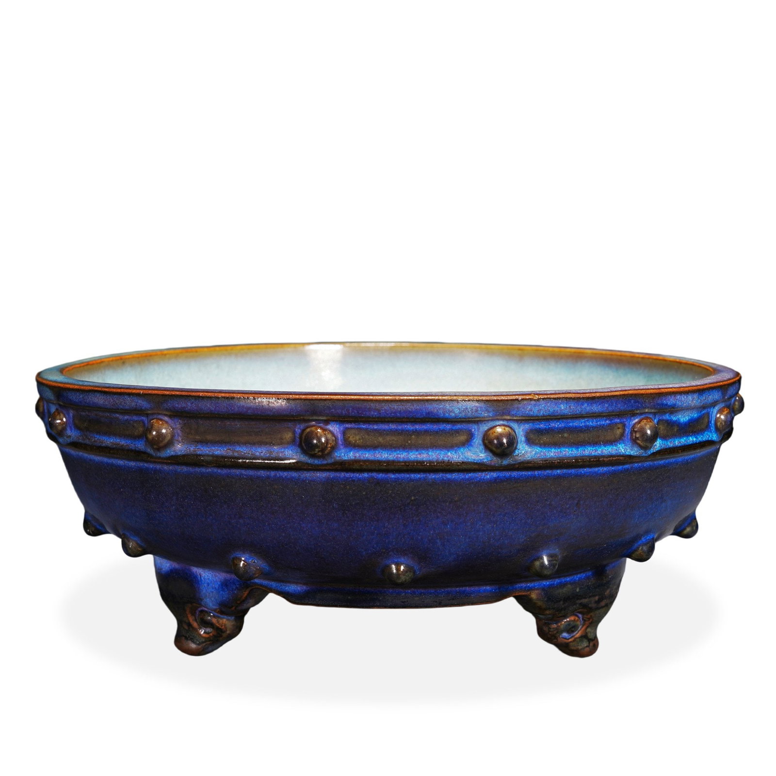 SONG DYNASTY JUN WARE ROSE-PURPLE GLAZED TRIPOD DRUM-NAIL BRUSH WASHER: 3 1/2 x 9 1/2 in (9 x 24 cm) Song Dynasty Jun Ware Rose-Purple Glazed Tripod Drum-Nail Brush Washer Dimensions: H: 3 1/2 in (9 cm); D: 9 1/2 in (24 cm) This refined brush washer exemplifies the