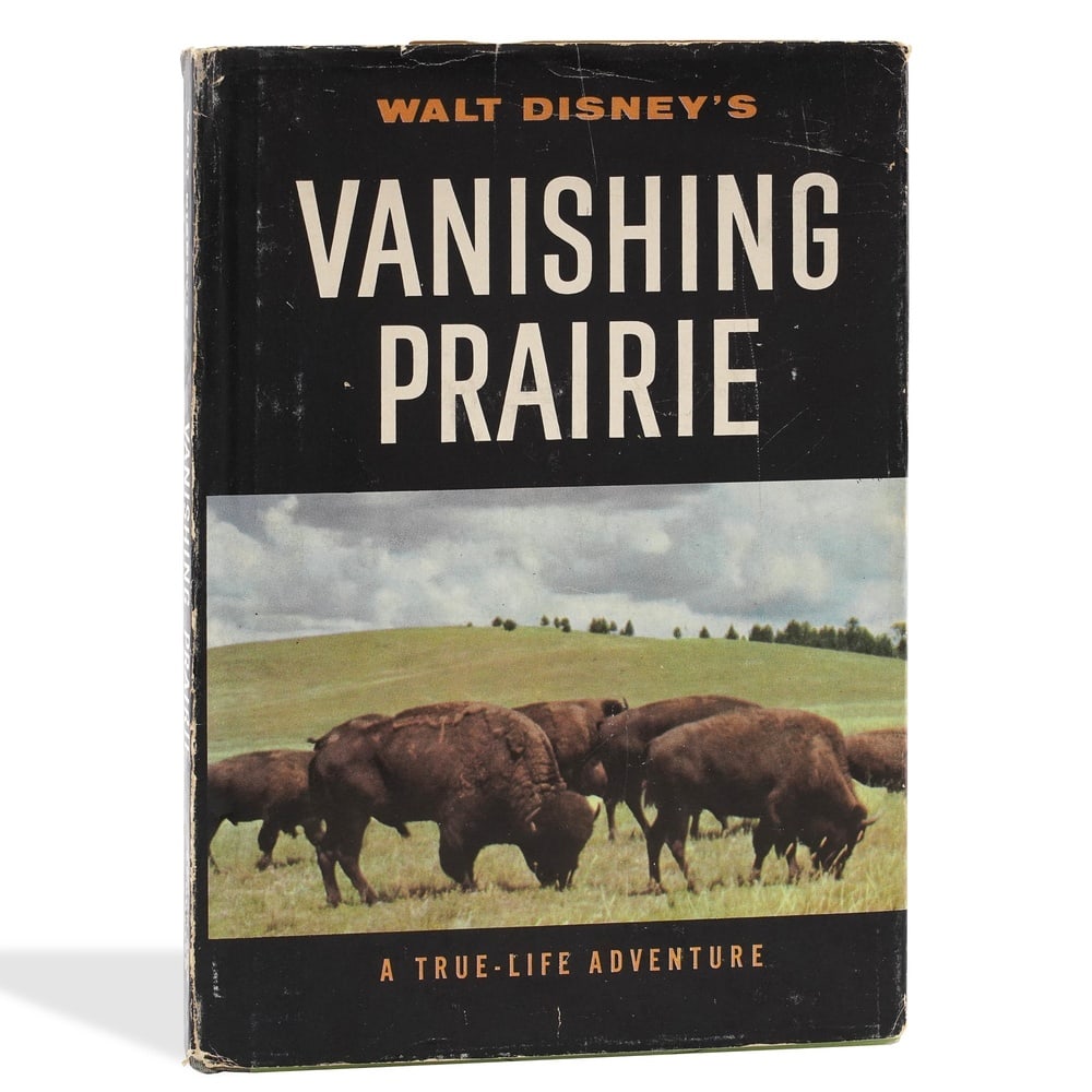WALT DISNEY SIGNED WALT DISNEY'S VANISHING PRAIRIE: A TRUE-LIFE ADVENTURE: 8 7/8 x 6 1/4 in (22.6 x 15.8 cm) Provenance and Authentication: According to the Letter of Authenticity (LOA) and Certificate of Authenticity (COA) provided by the consignor, this collectible was