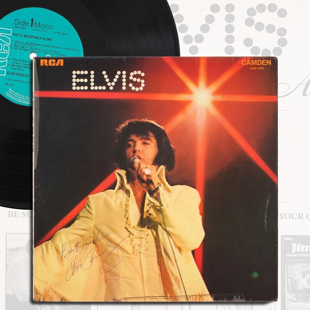 ELVIS PRESLEY SIGNED "YOU'LL NEVER WALK ALONE" LP: 12 1/4 x 12 1/4 in Provenance and Authentication: According to the Letter of Authenticity (LOA) and Certificate of Authenticity (COA) provided by the consignor, this collectible was subjected to a
