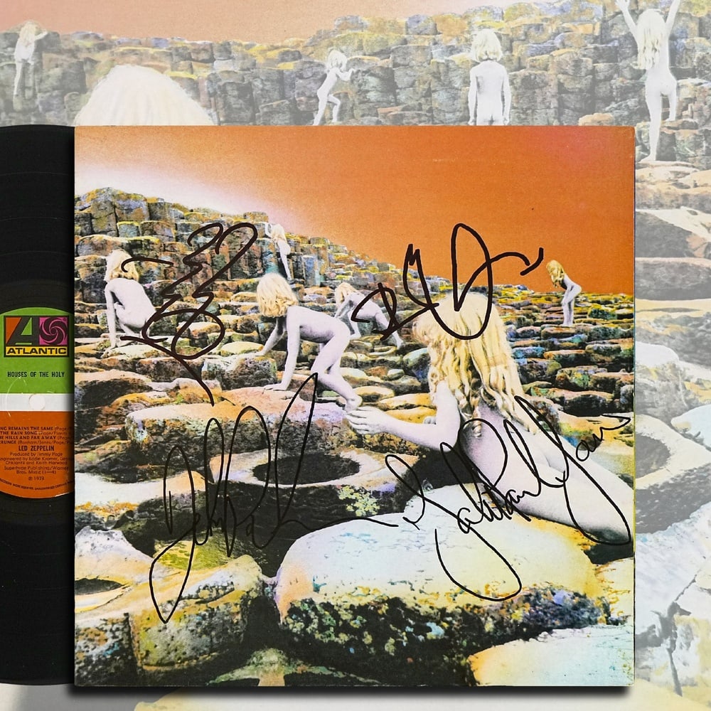 LED ZEPPELIN FULLY SIGNED 1973 UK FIRST PRESSING "HOUSES OF THE HOLY" LP: 12 1/4 x 12 1/4 in Provenance and Authentication: According to the accompanying documentation provided by the consignor, the signatures have been examined with reference to multiple factors,