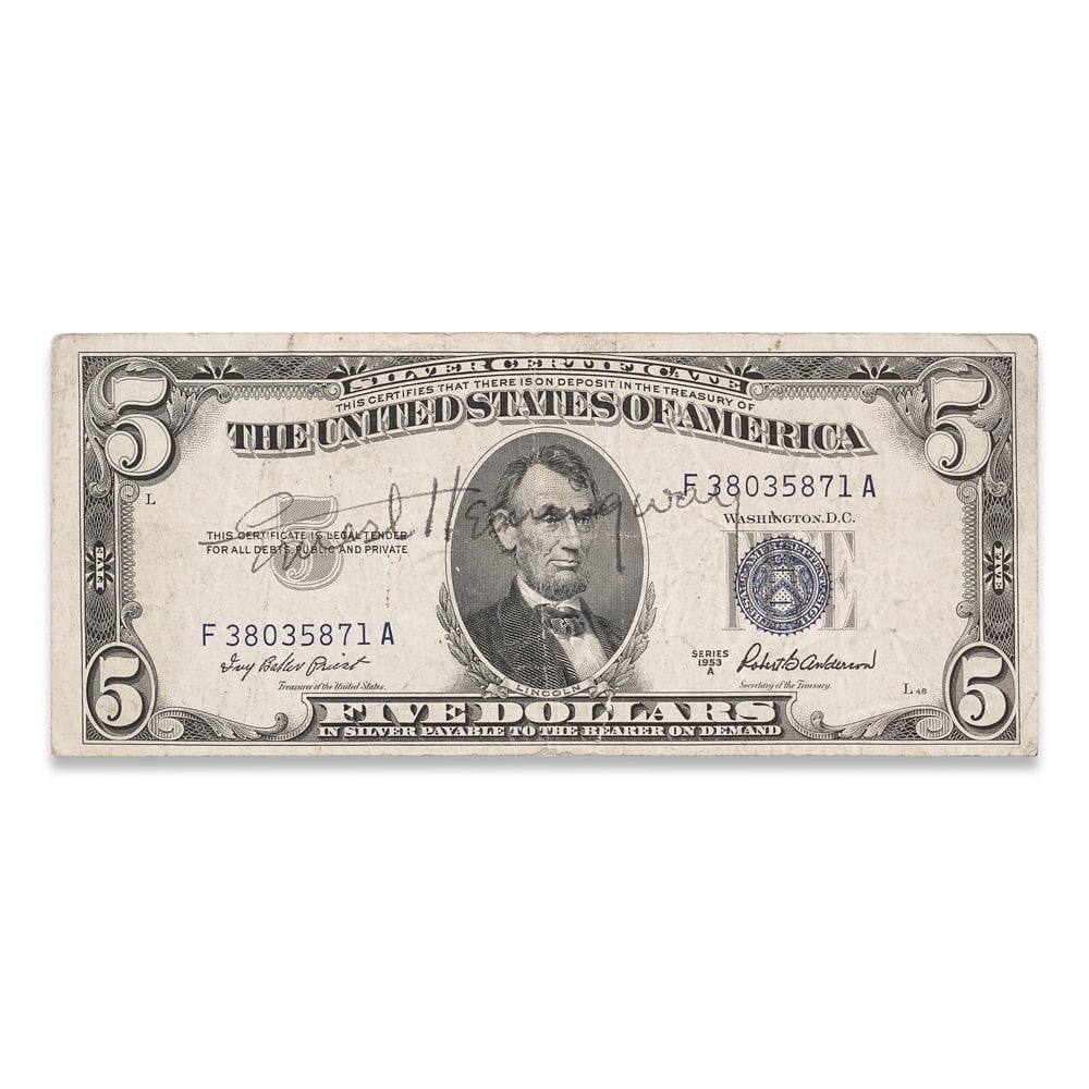 ERNEST HEMINGWAY SIGNED 1953A FIVE DOLLAR SILVER CERTIFICATE: 6 1/8 x 2 1/2 in (15.5 x 6.5 cm) Provenance and Authentication: According to the Letter of Authenticity (LOA) and Certificate of Authenticity (COA) provided by the consignor, this collectible was subj