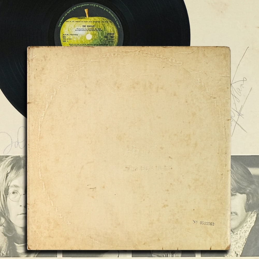THE BEATLES FULLY SIGNED 1968 UK NUMBERED "WHITE ALBUM" 2-LP: 12 1/4 x 12 1/4 in Provenance and Authentication: According to the accompanying documentation provided by the consignor, the signatures have been examined with reference to multiple factors, including