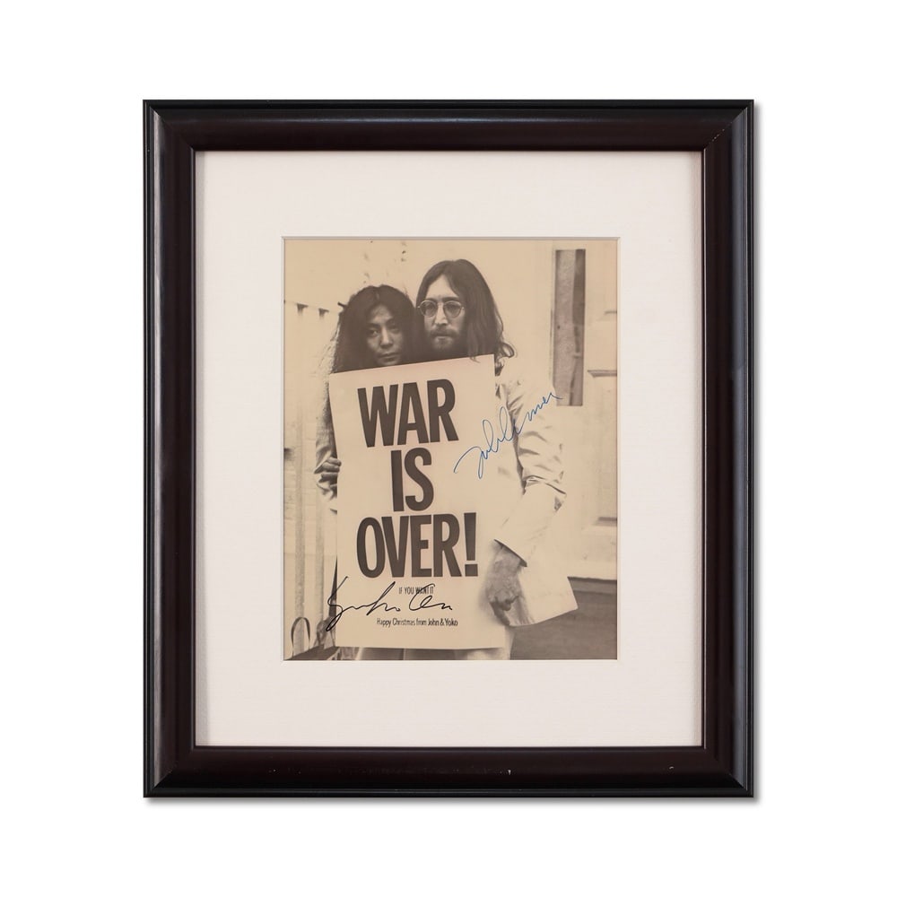JOHN LENNON & YOKO ONO SIGNED GELATIN SILVER PHOTOGRAPH: Image dimensions: 9 x 7 1/4 in (23 x 18.4 cm) Provenance and Authentication: According to the Letter of Authenticity (LOA) and Certificate of Authenticity (COA) provided by the consignor, this collect